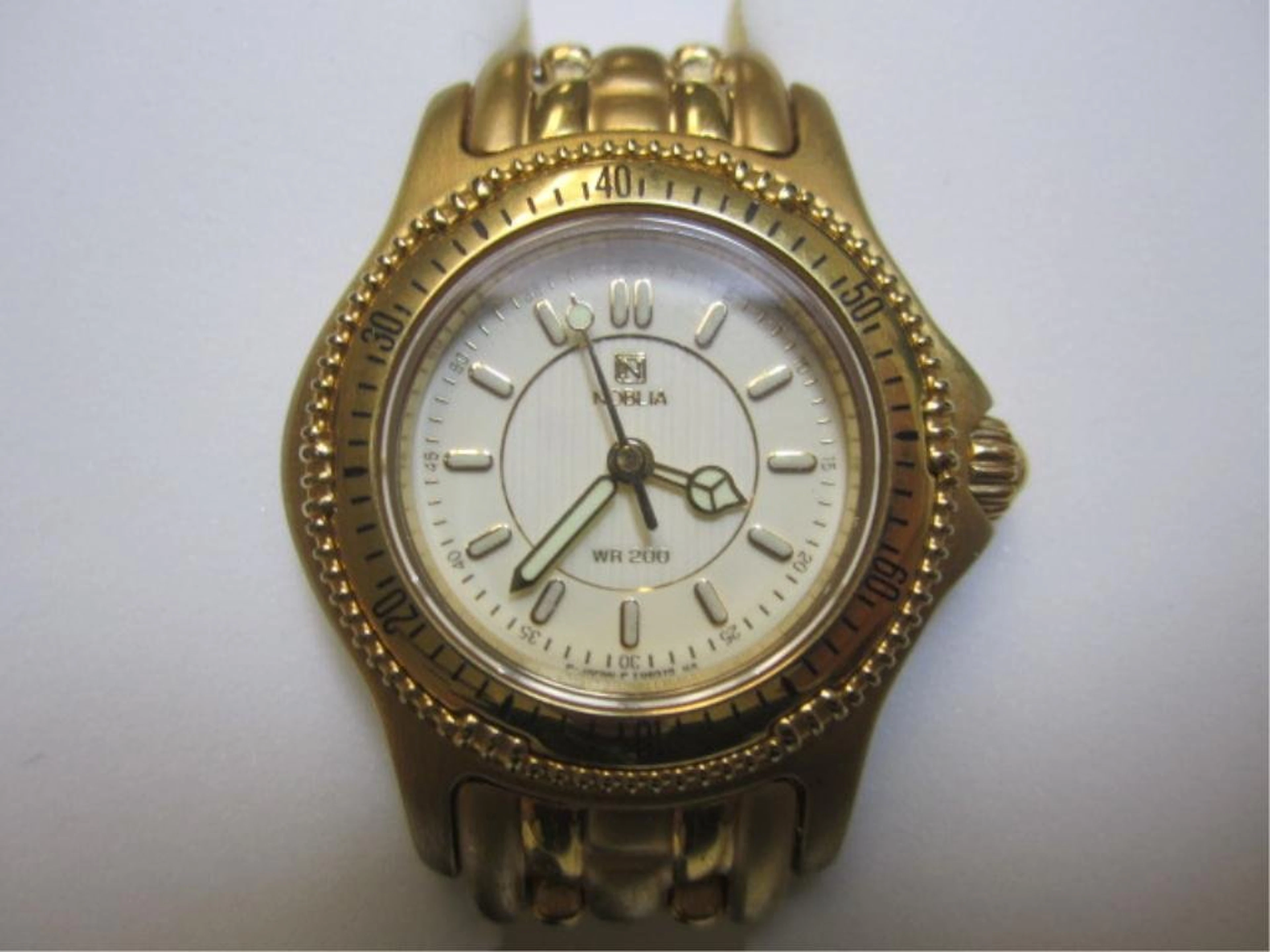 240g: a27-28 one new ladies gold plated noblia watch