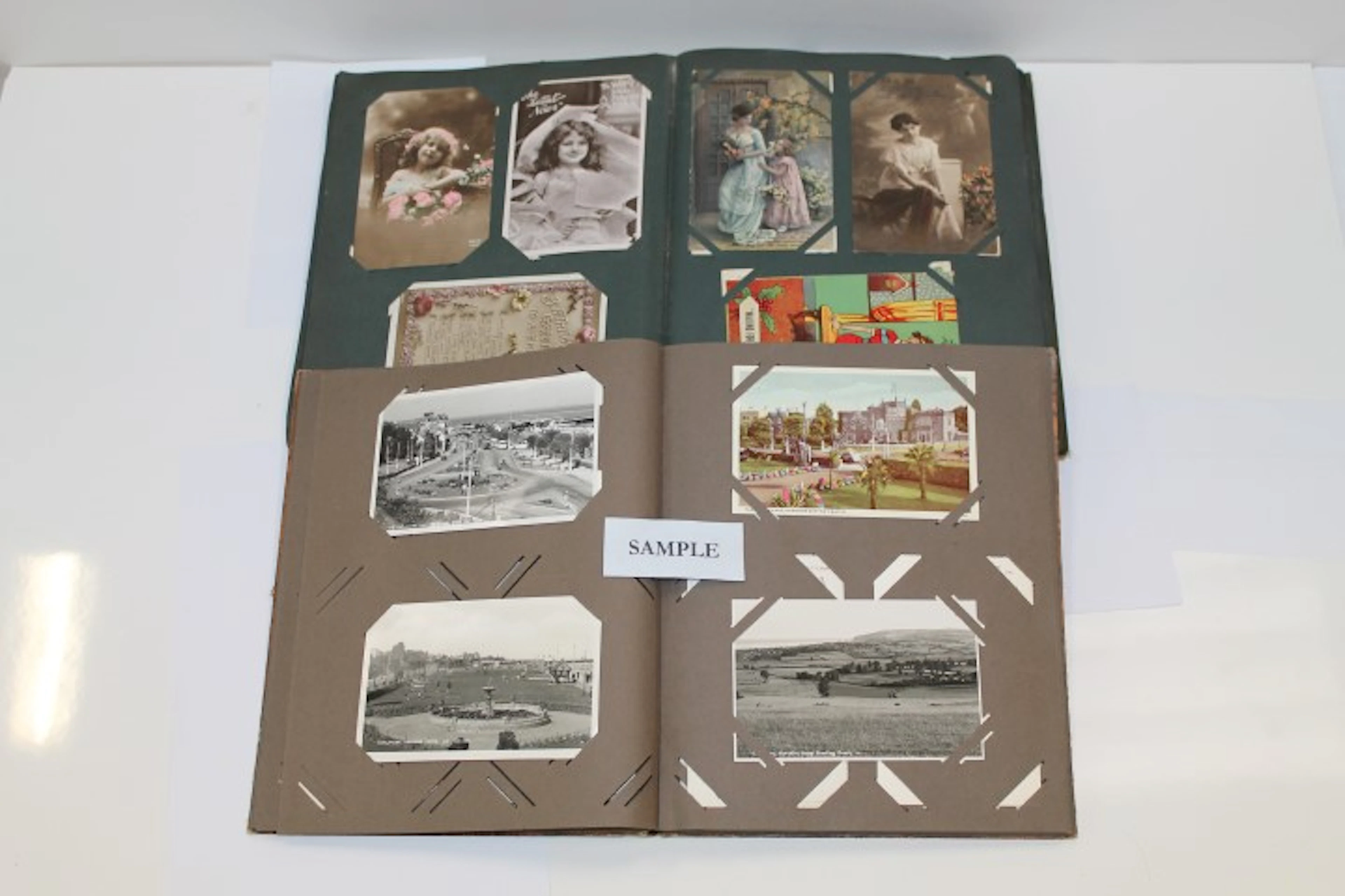 Postcards in two albums including military - G.B. topography