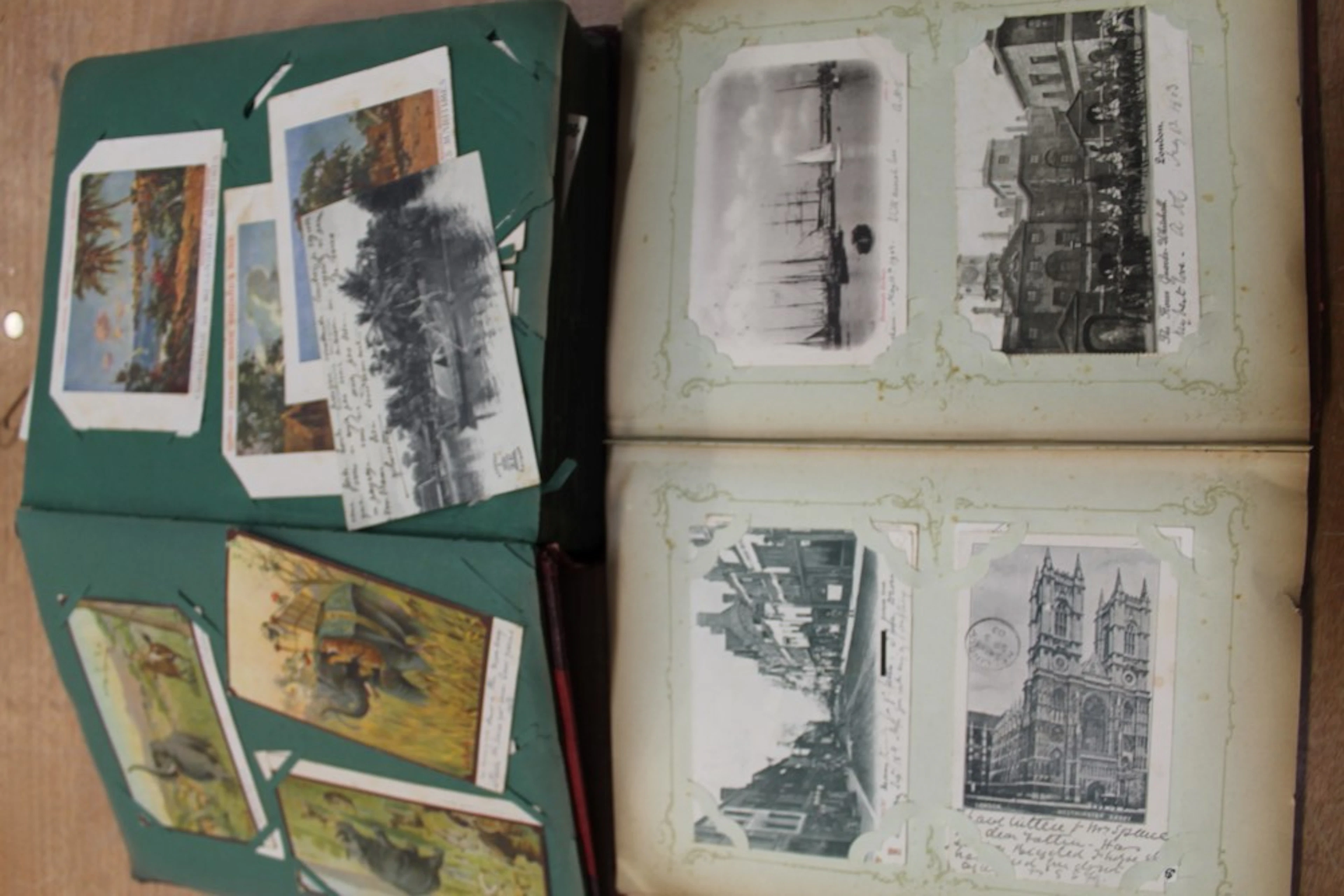 Postcards in album - including early Japanese advertisement Asahi Beer