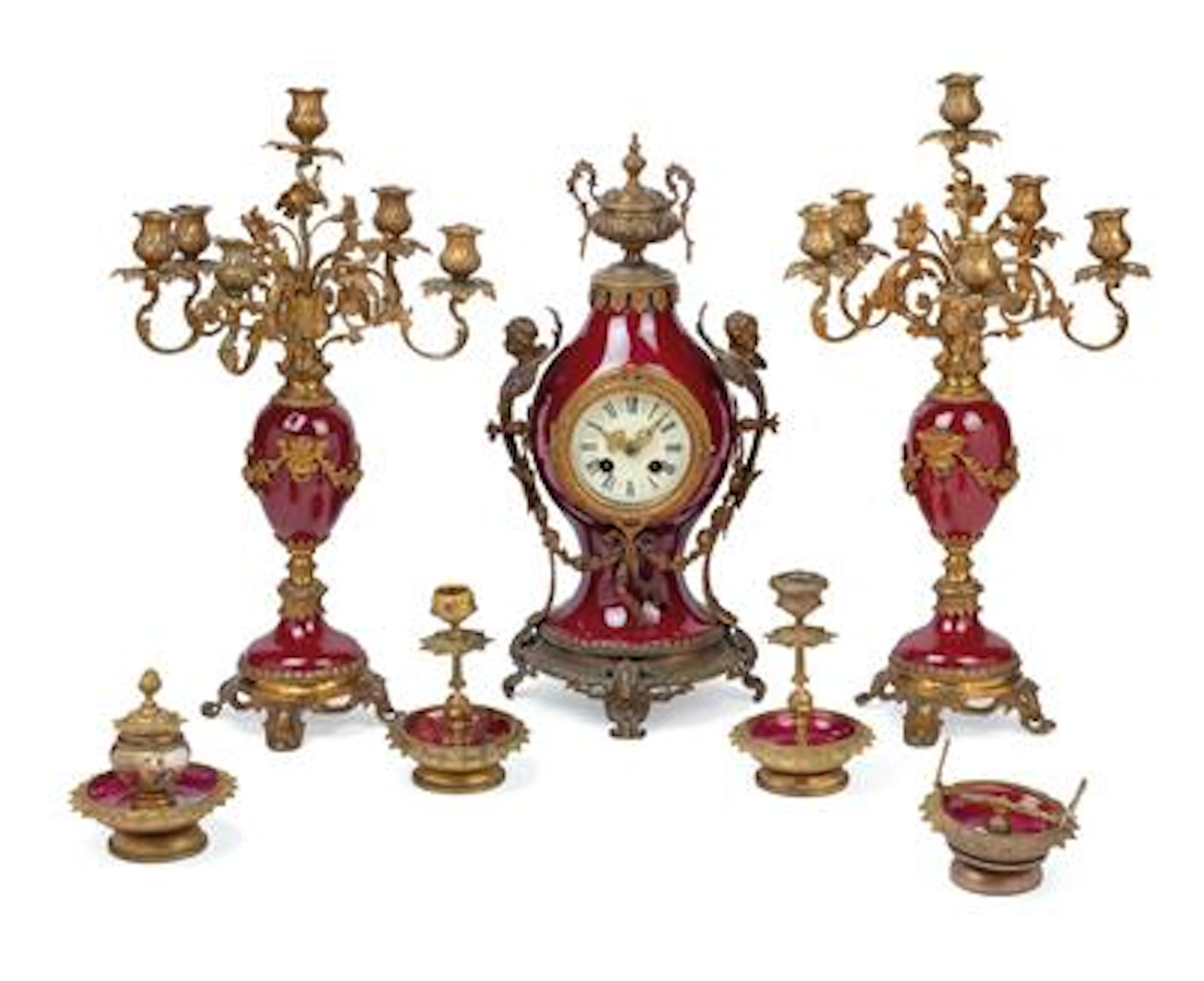 A fin de siècle ceramic mantelpiece set