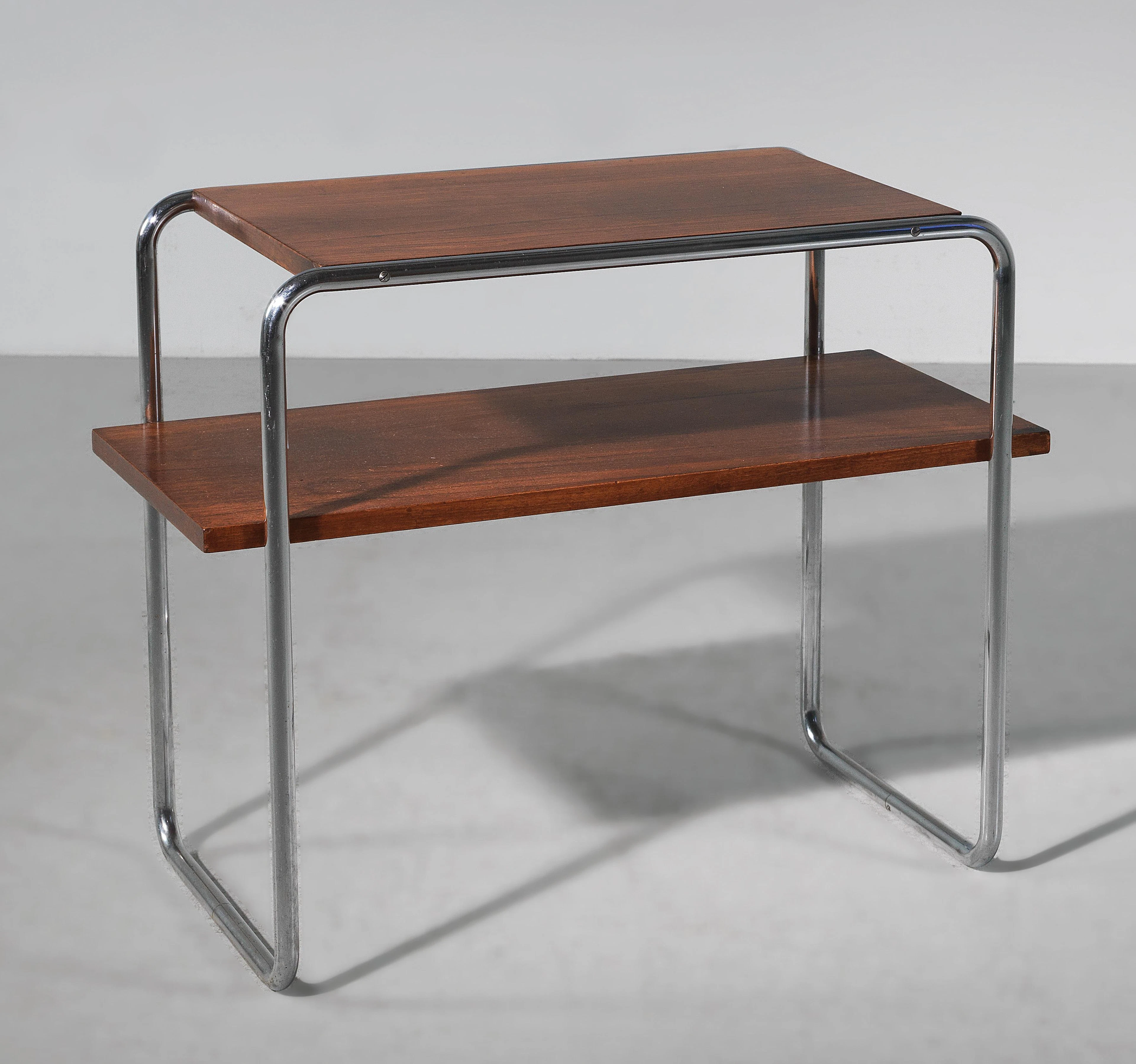 A side table with a platform stretcher, Model No. B 12, designed by