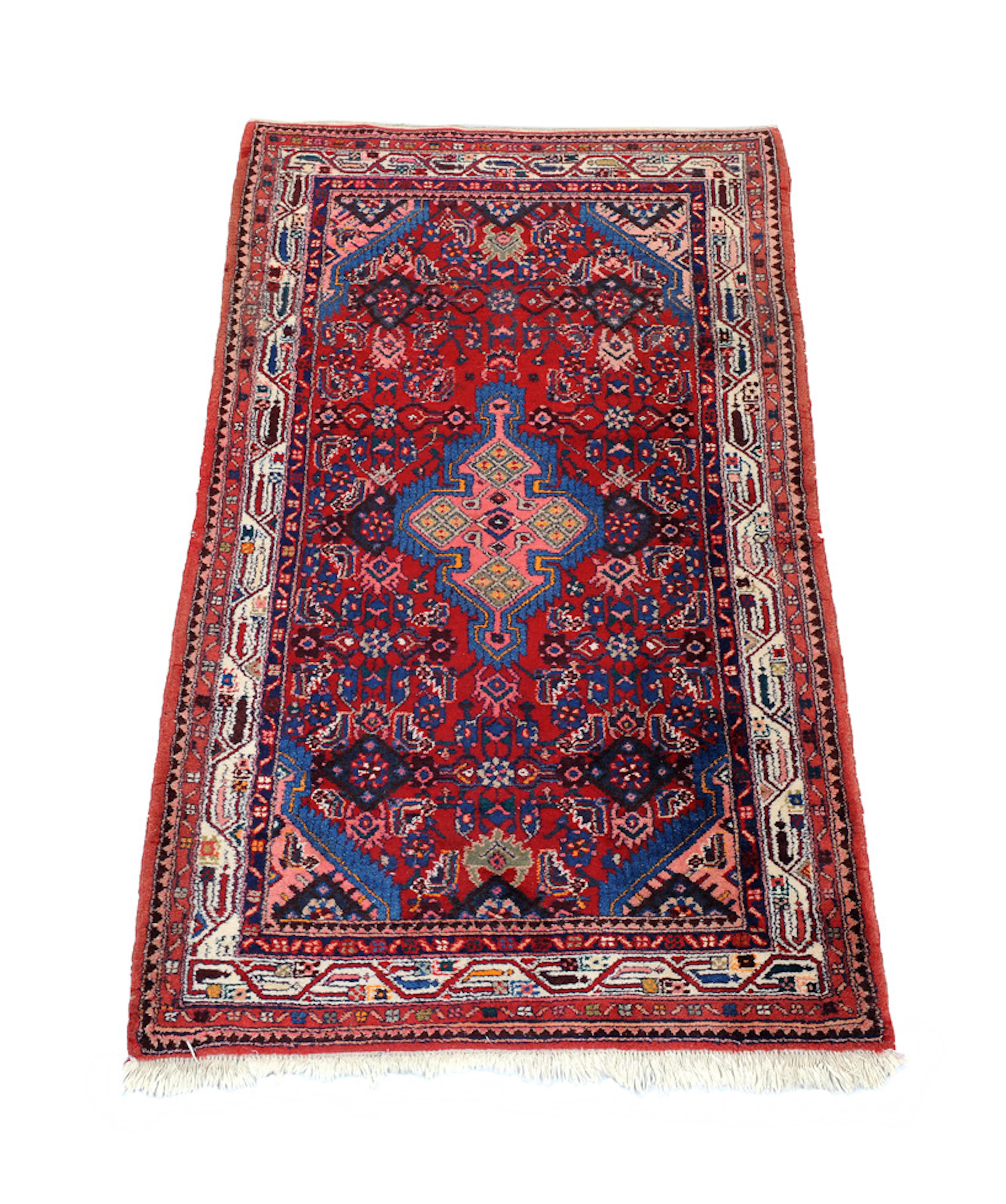 ORIENTTEPPICH. Roter Flor mit blau abgesetztem Kreuzmedaillion, Bordüren.