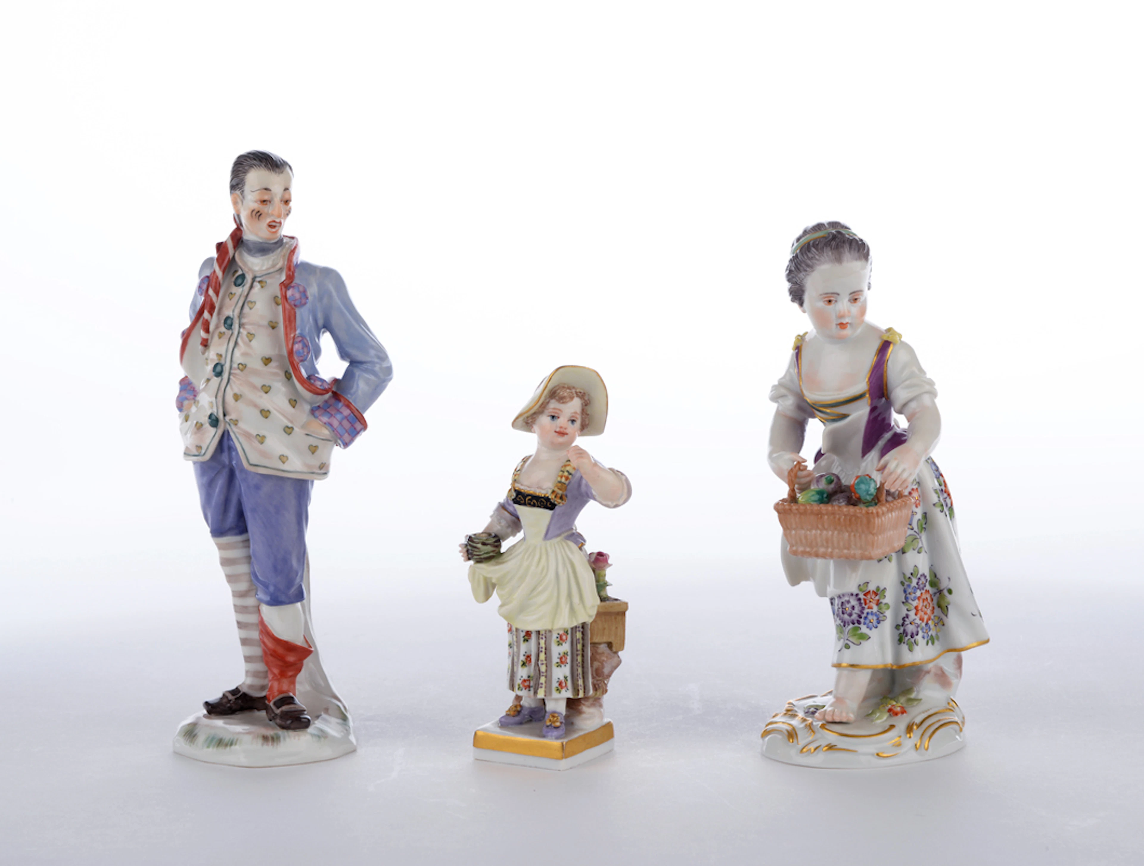 3 Porzellanfiguren. Porzellanmanufaktur Meissen. Figur klein 2. Hälfte 19. Jahrhundert, 2 Figuren 20. Jahrhundert.