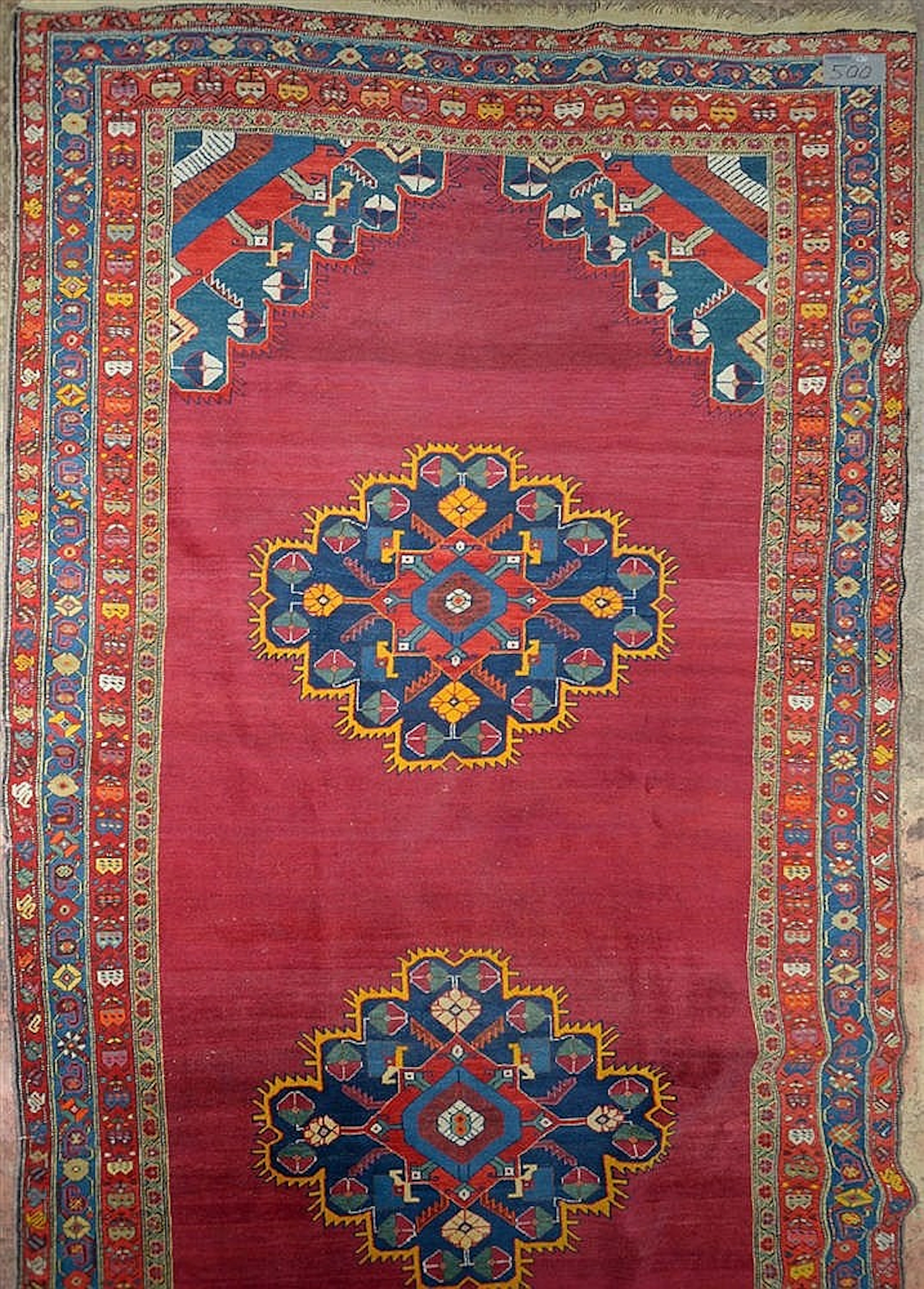 Grand tapis Shirvan à décor géométrique sur fond rouge. Travail turc ancien