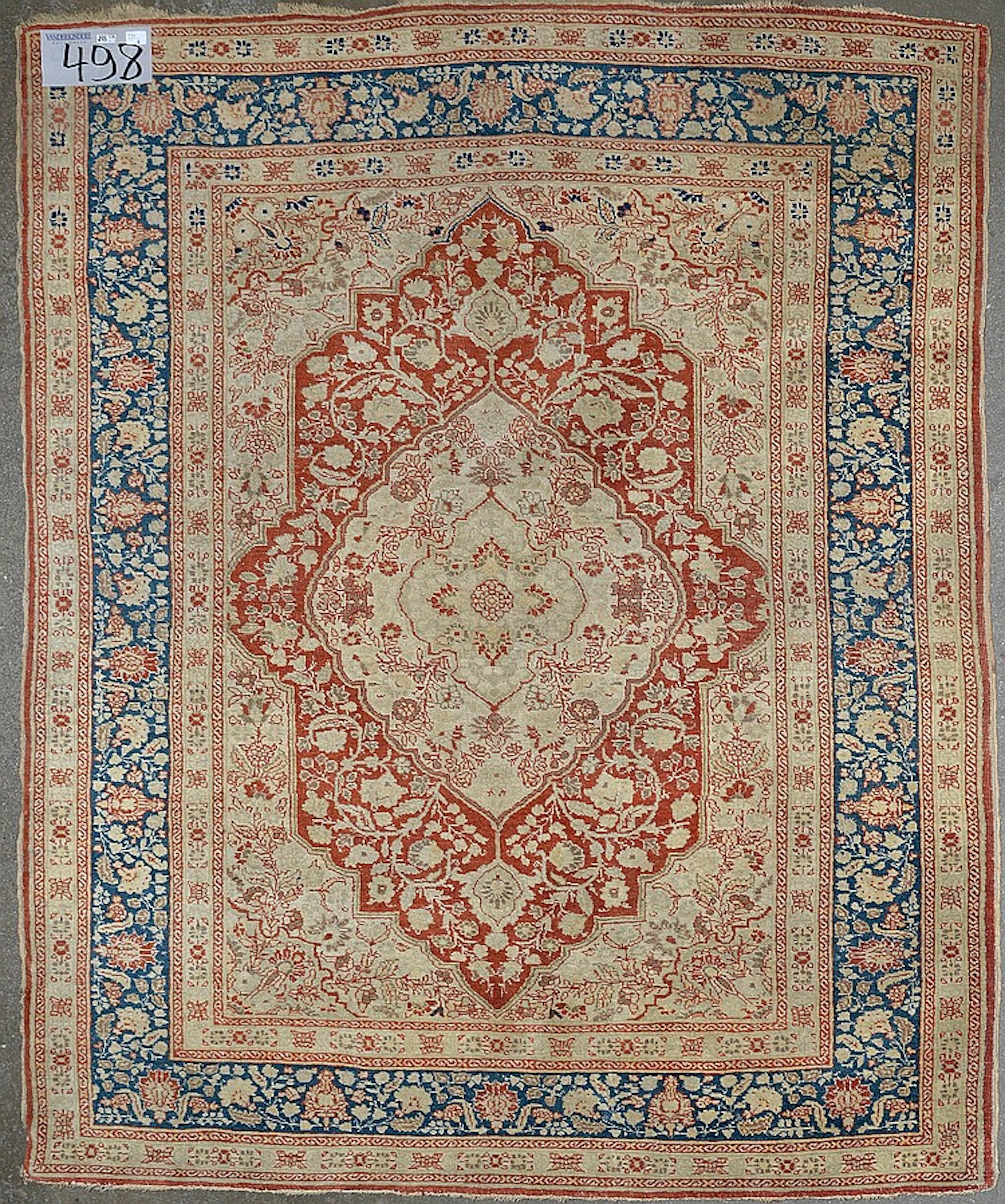 Petit tapis en laine fait main à décor floral à mé