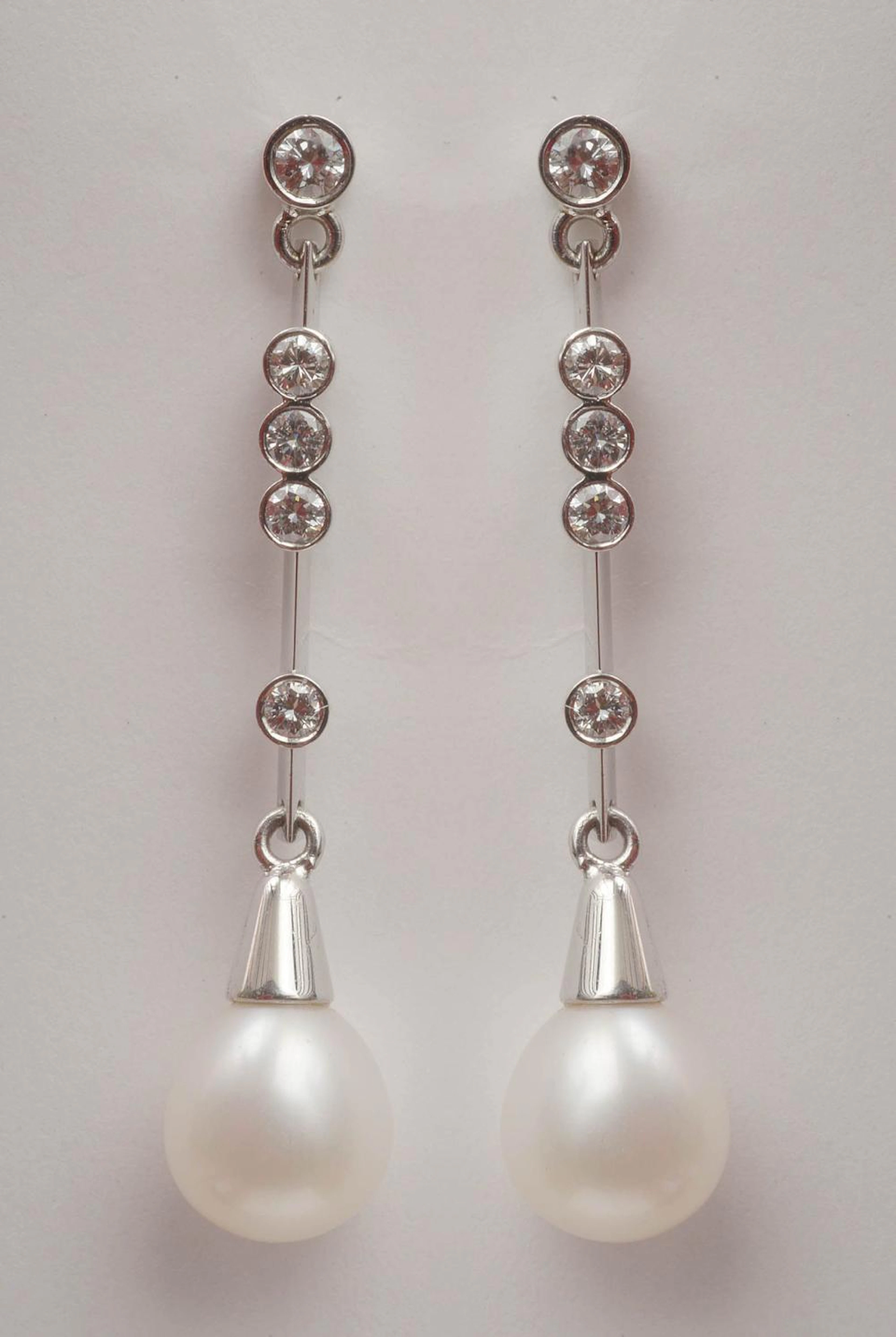 Bijouterie Paire de boucles d'oreilles en or blanc 18 carats serties de