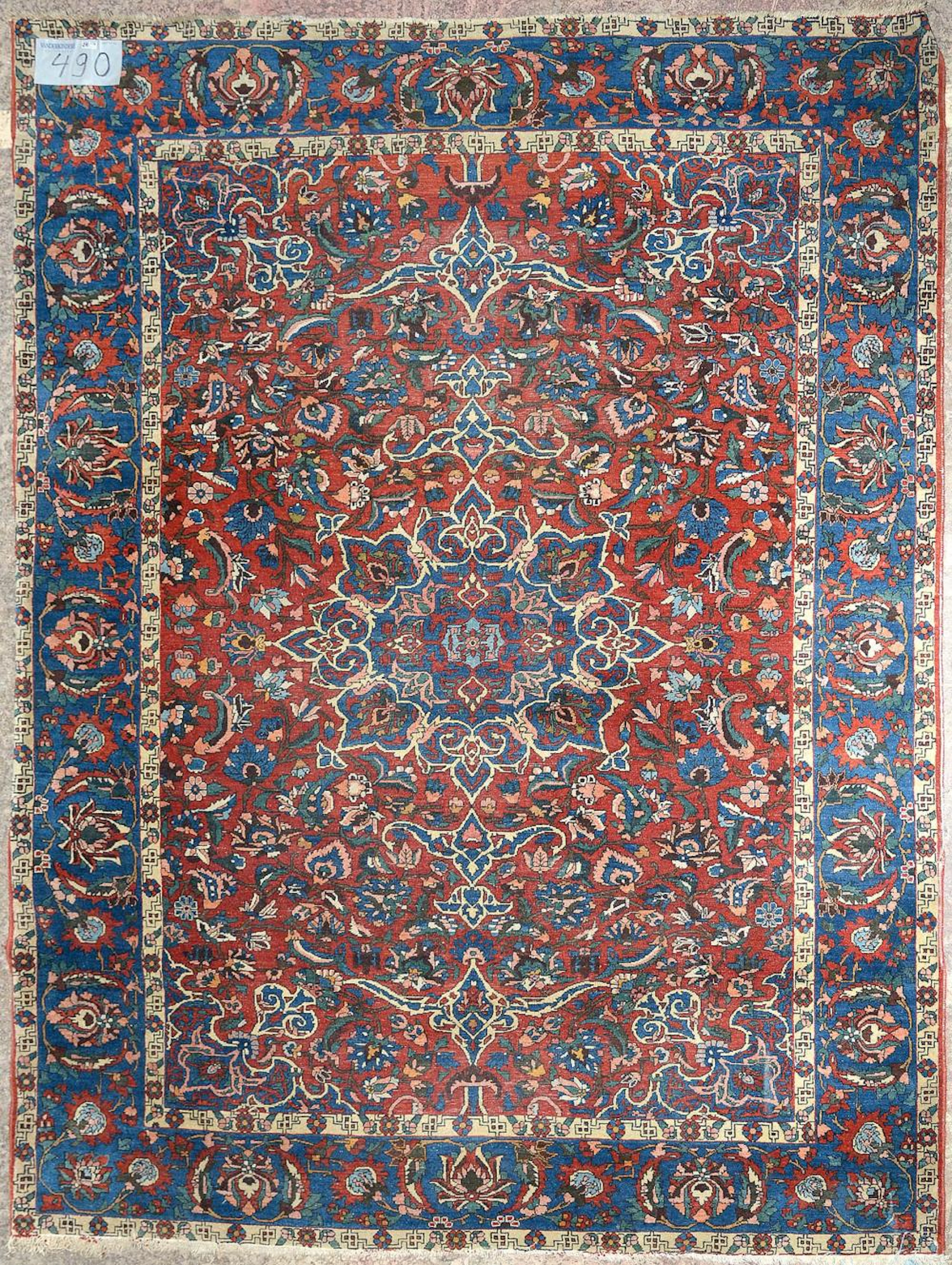 Tapis Carpette en laine Sarouk à décor floral stylisé. Travail persan a