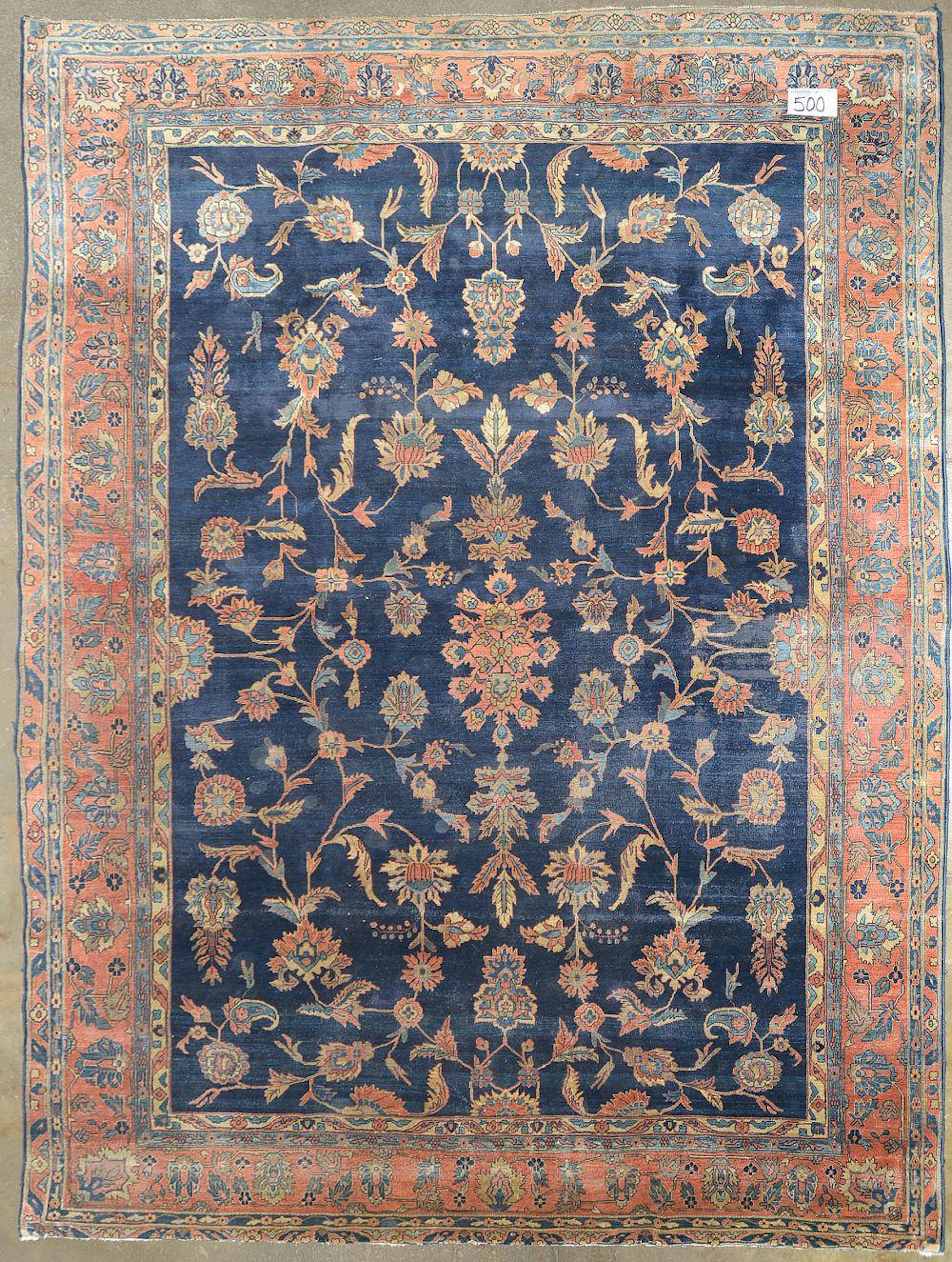 Grand tapis dit "Sarouk américain" en laine à décor floral bleu