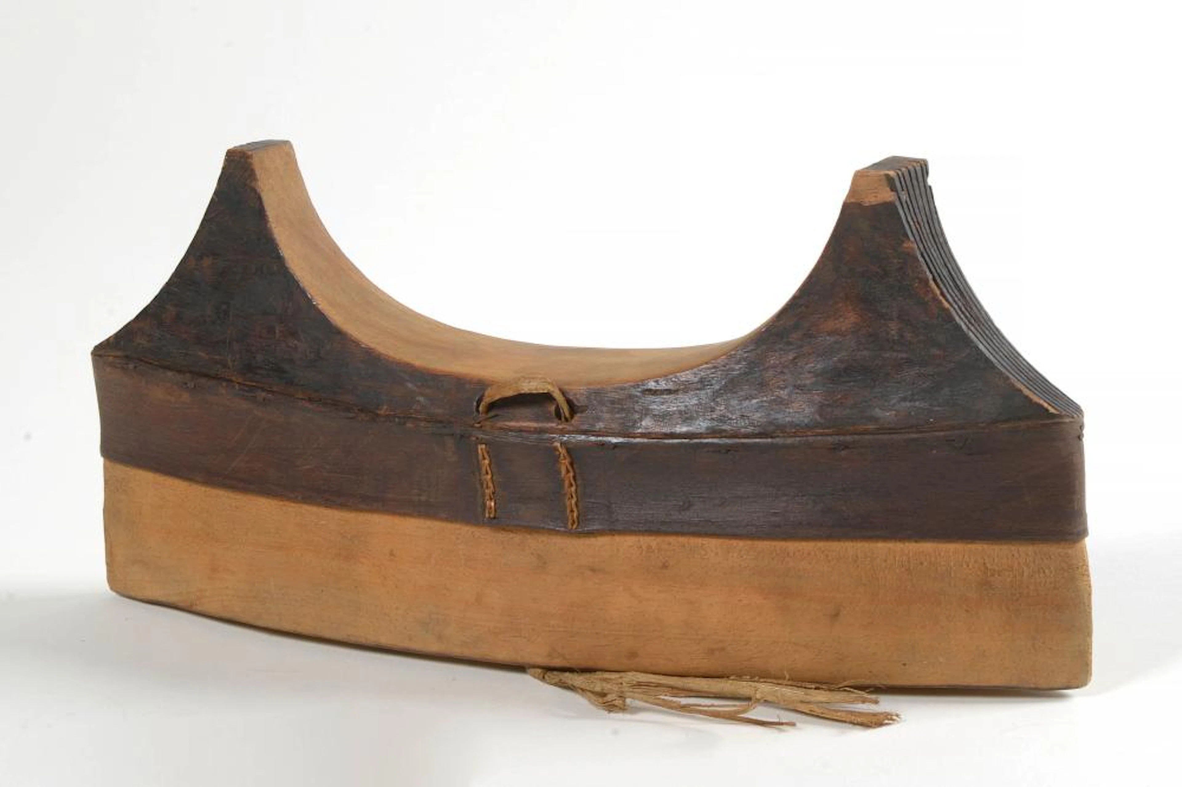 Un appuie-nuque Magbetu en forme de boîte, en bois?