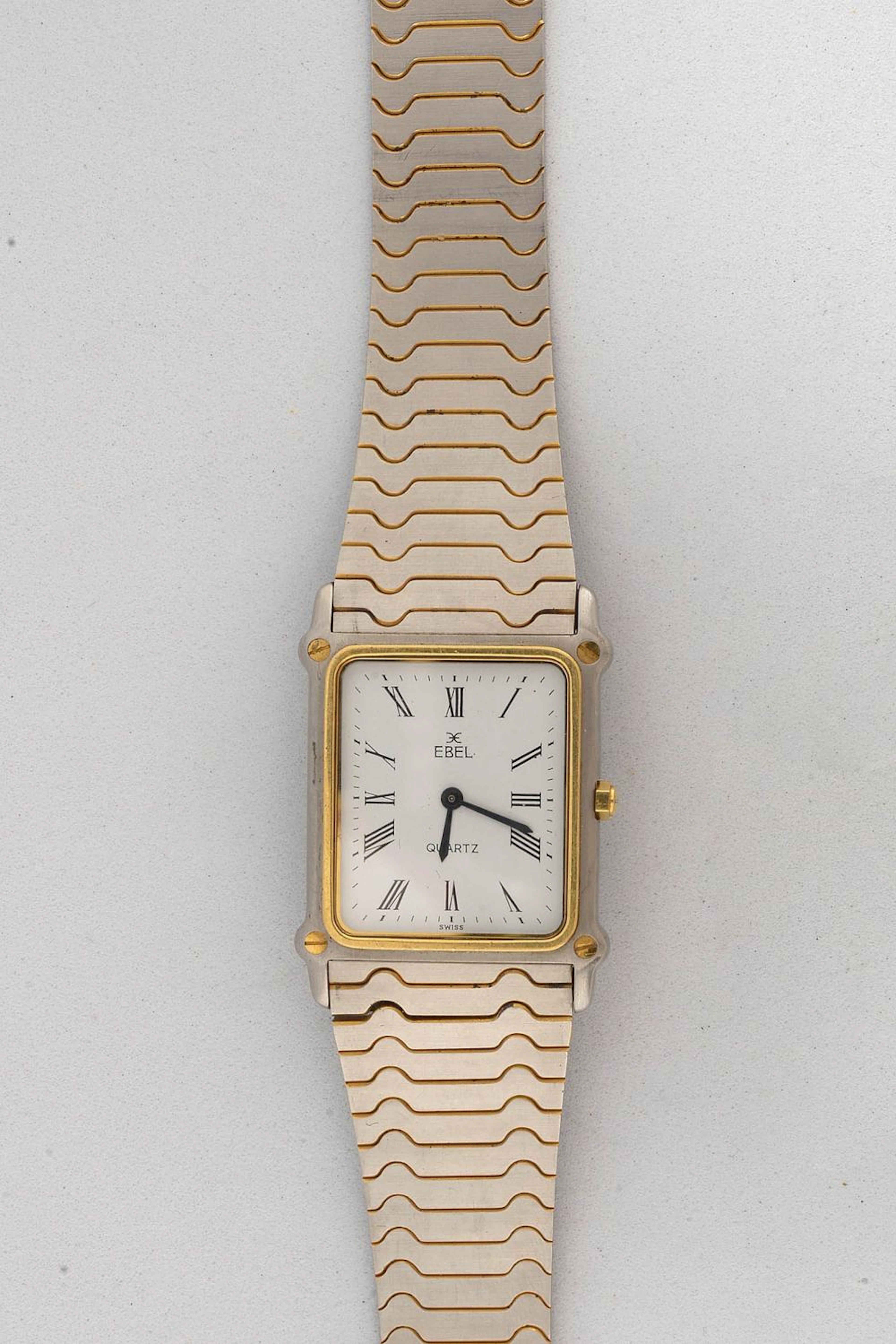 Montre homme de marque Ebel en complet acier et or jaune 18 carats
