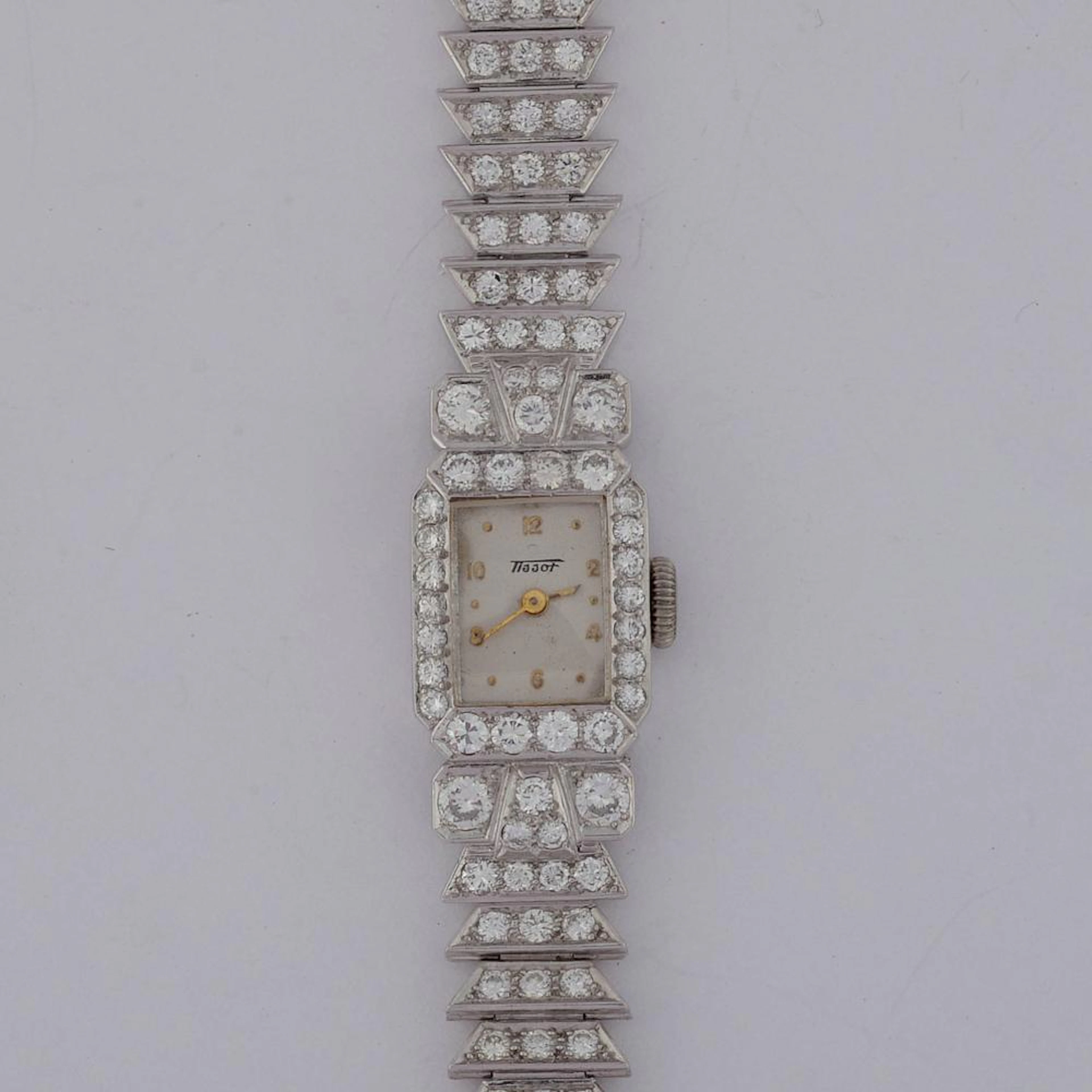 Horlogerie Montre pour dame en complet or blanc 18 carats de marque