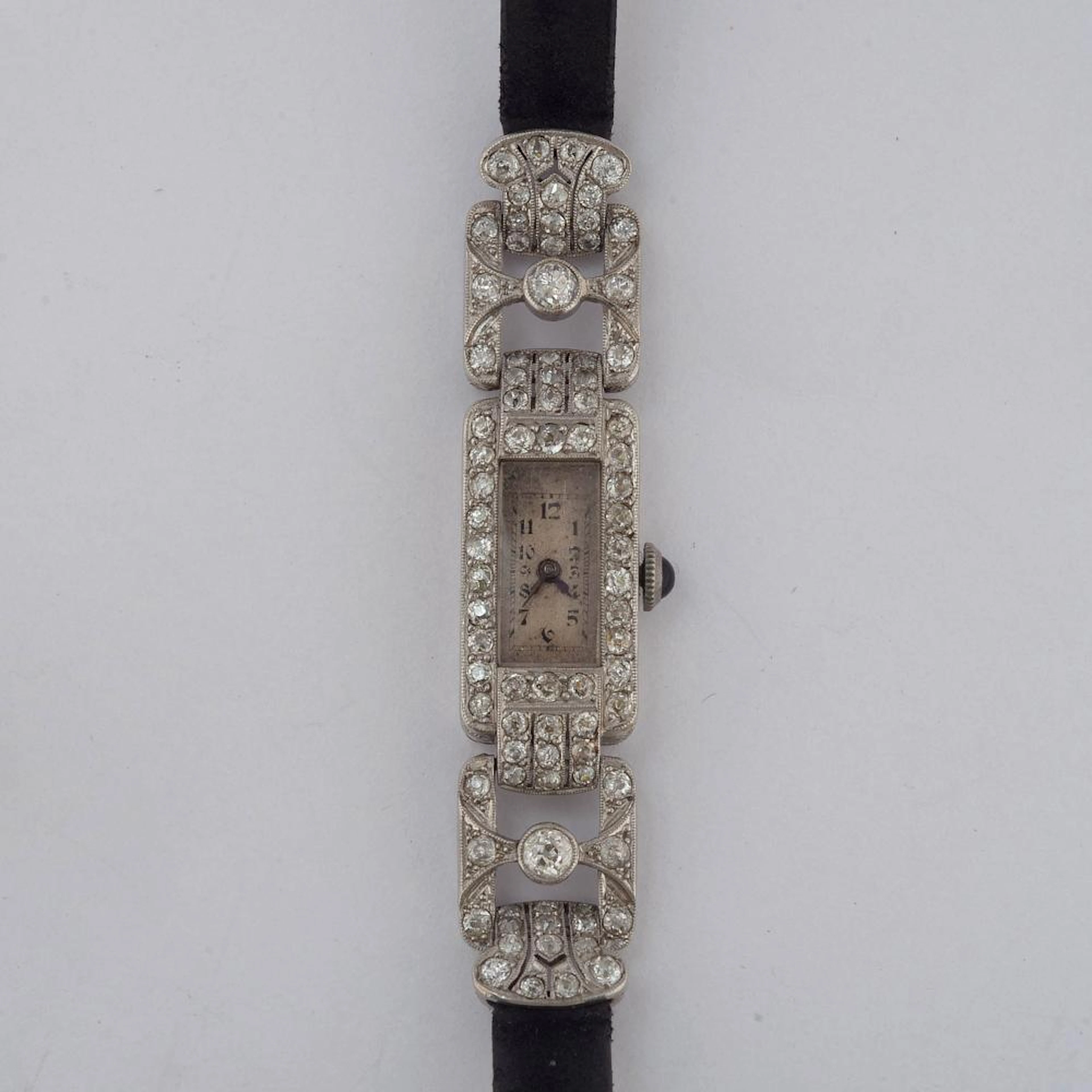 Horlogerie Montre Art Déco en platine sertie de diamants taille anci