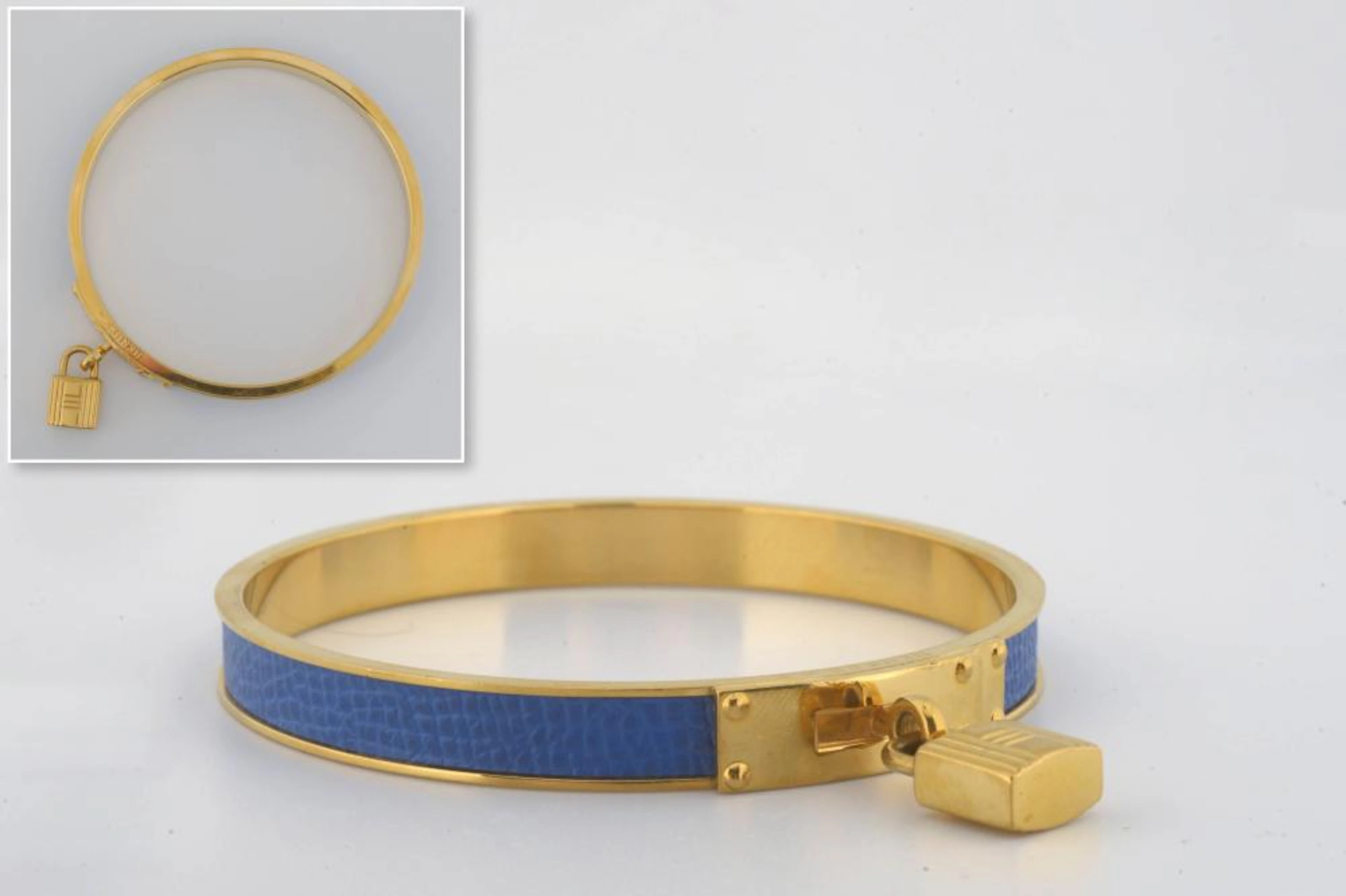 HERMES Bracelet en plaqué or et cuir bleu de marqu?