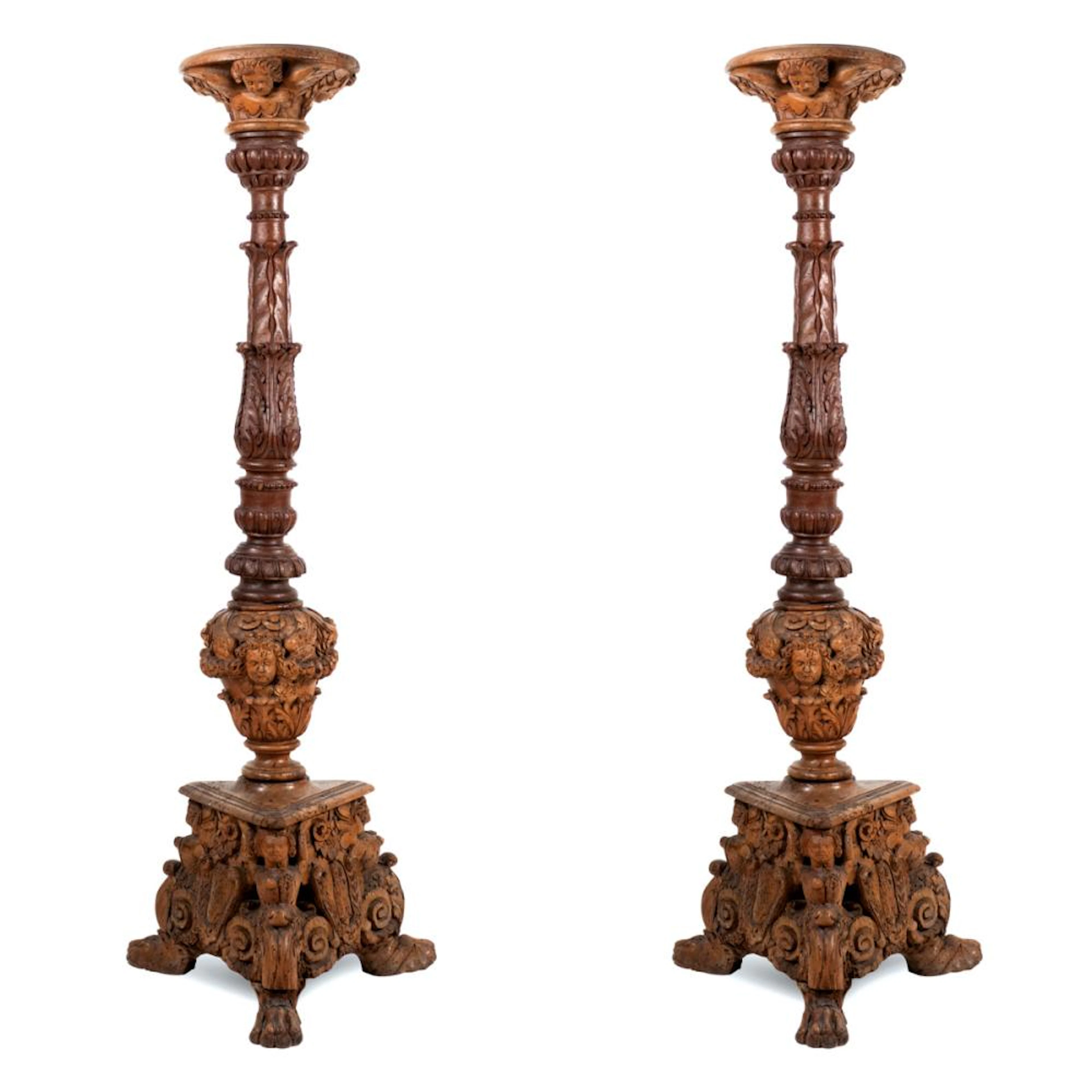 Pair of wood torchers