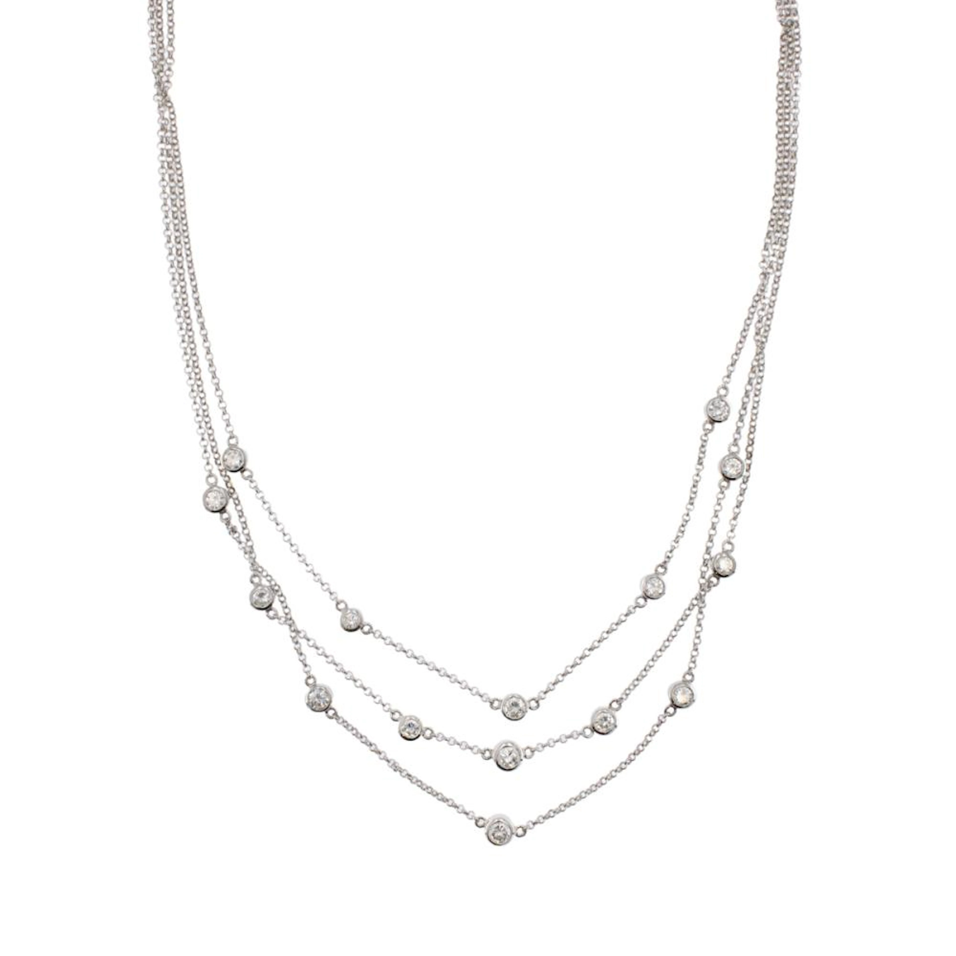 Three-strand necklace in 18kt white gold and diamonds