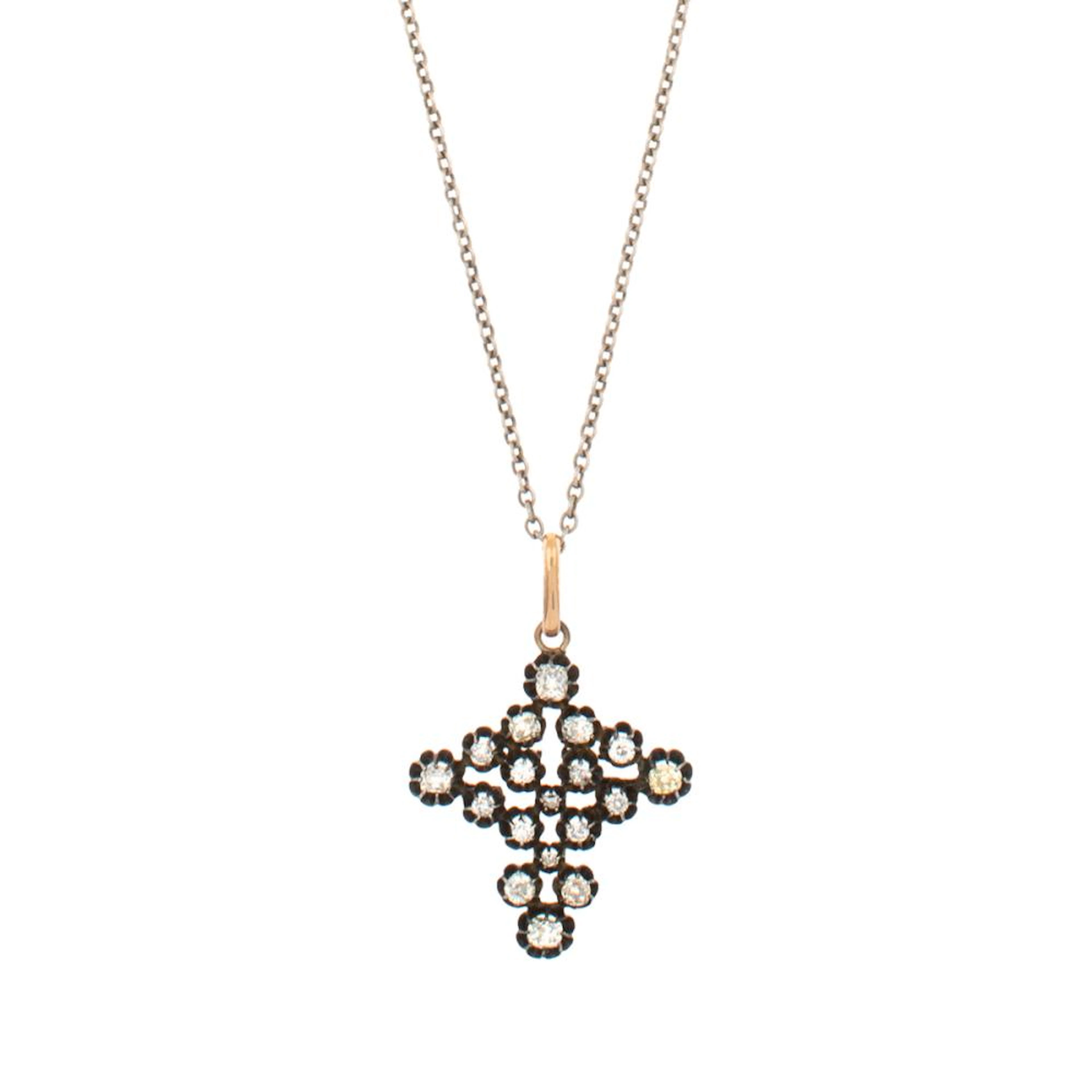 Gold silver and coroné roses cross pendant