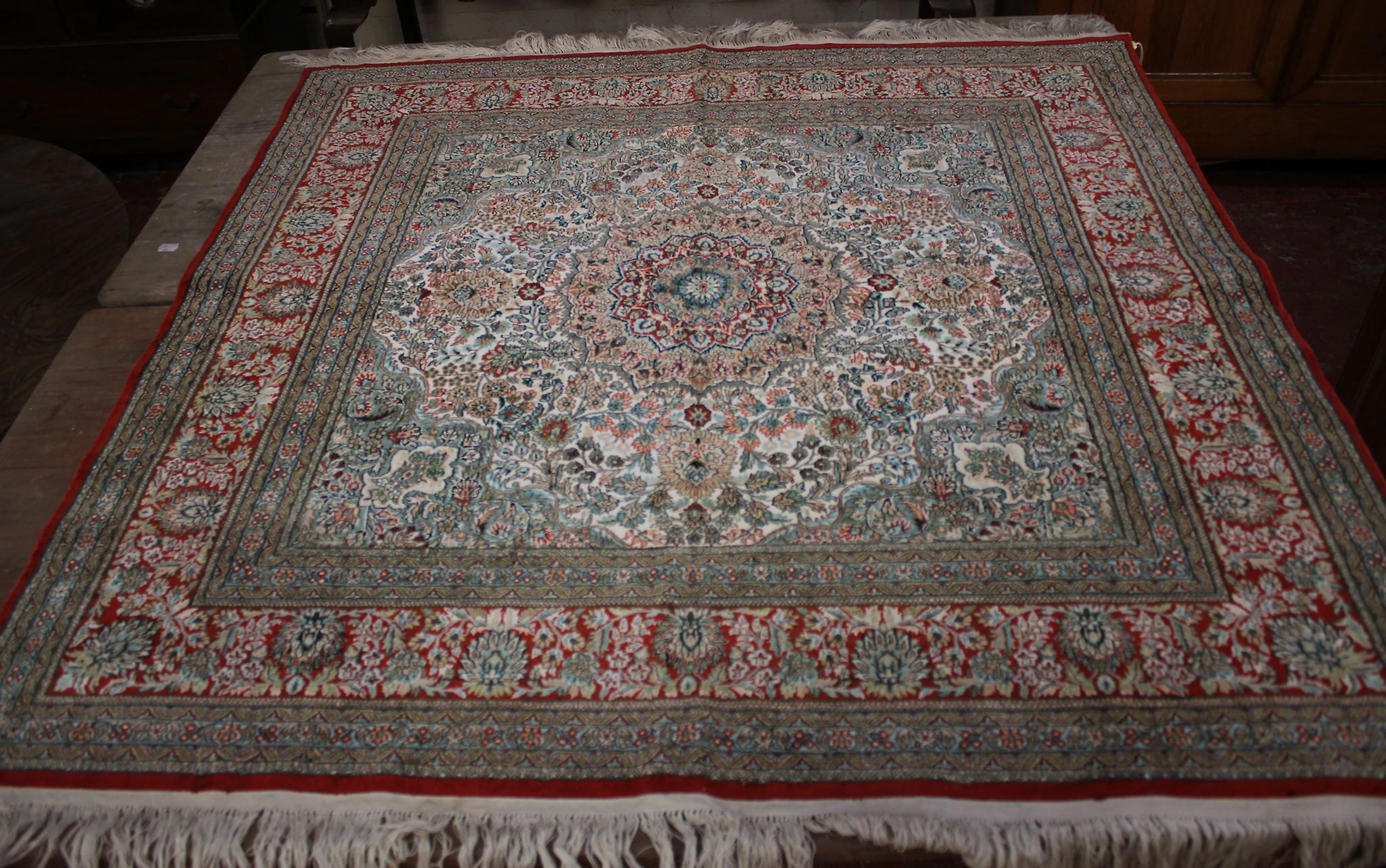 A silk Tabriz modern rug 124 x 122cm