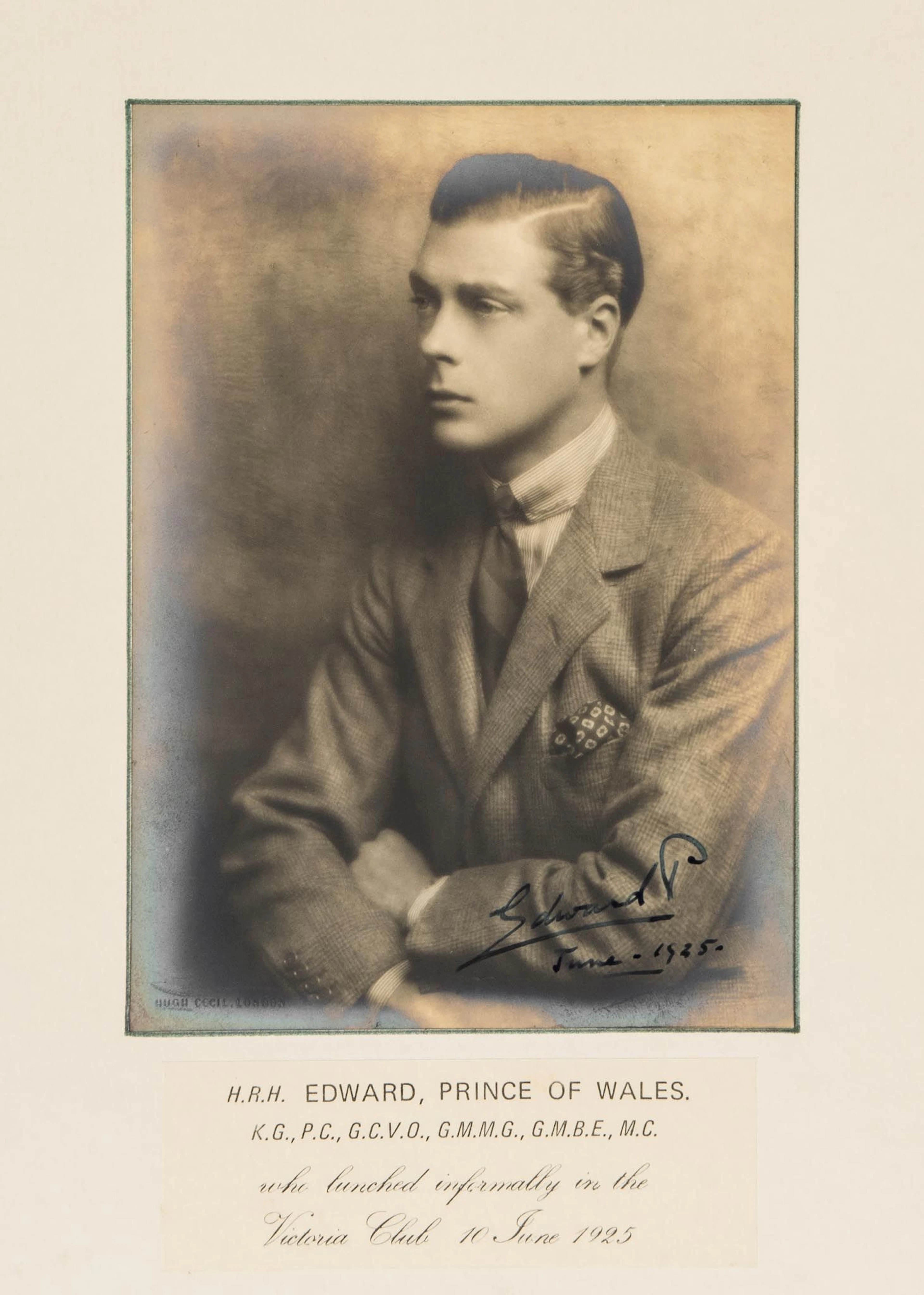 An elegant 24.1 x 18.9cm, bromide-print, head and shoulders photograph by...