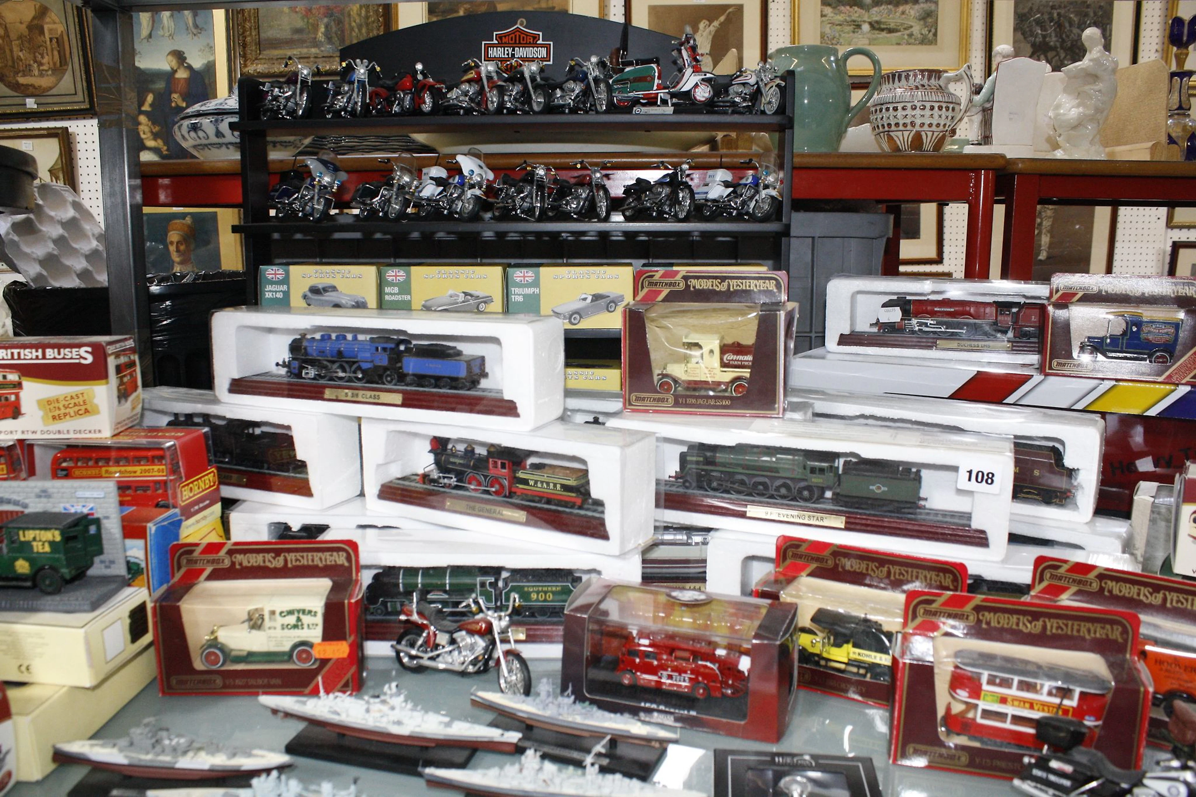 A miscellaneous collection of loose and boxed cars