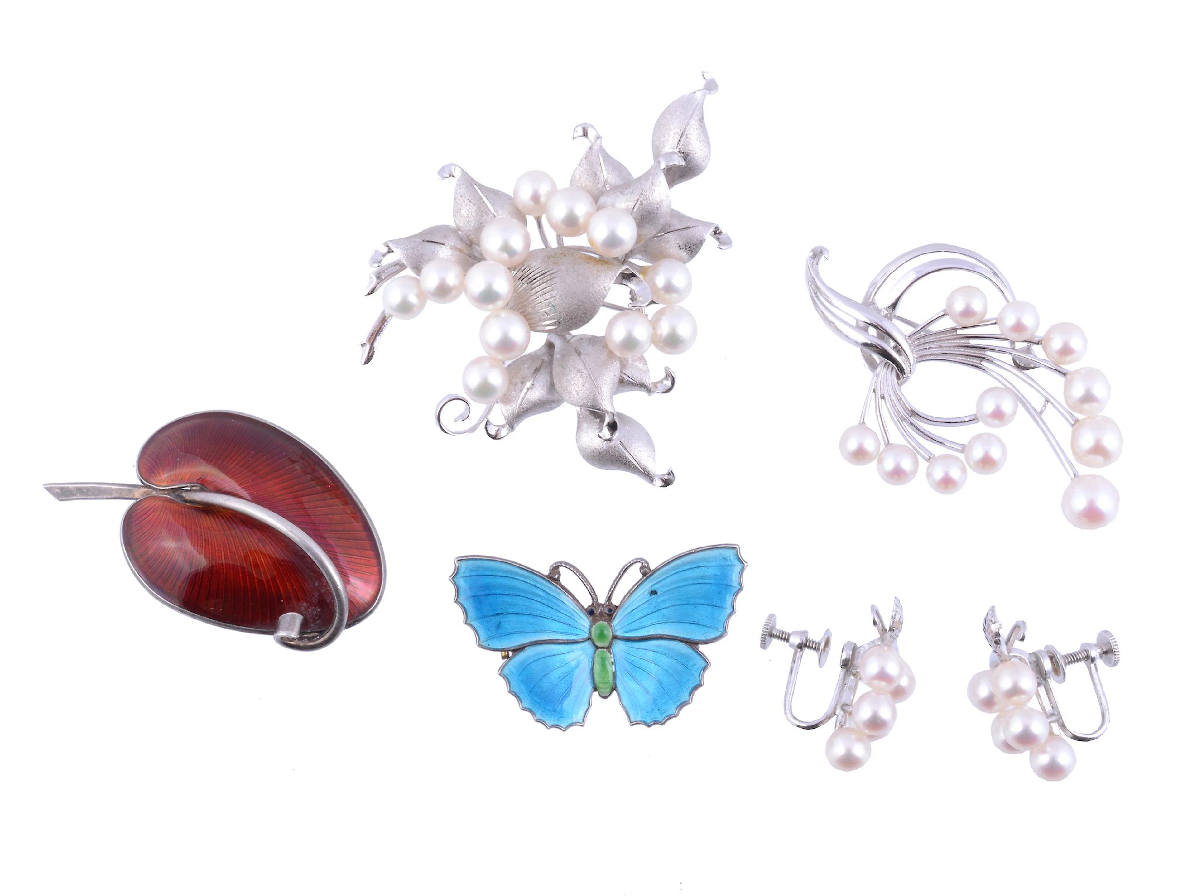 A cultured pearl brooch by Mikimoto, the spray set with cultured pearls