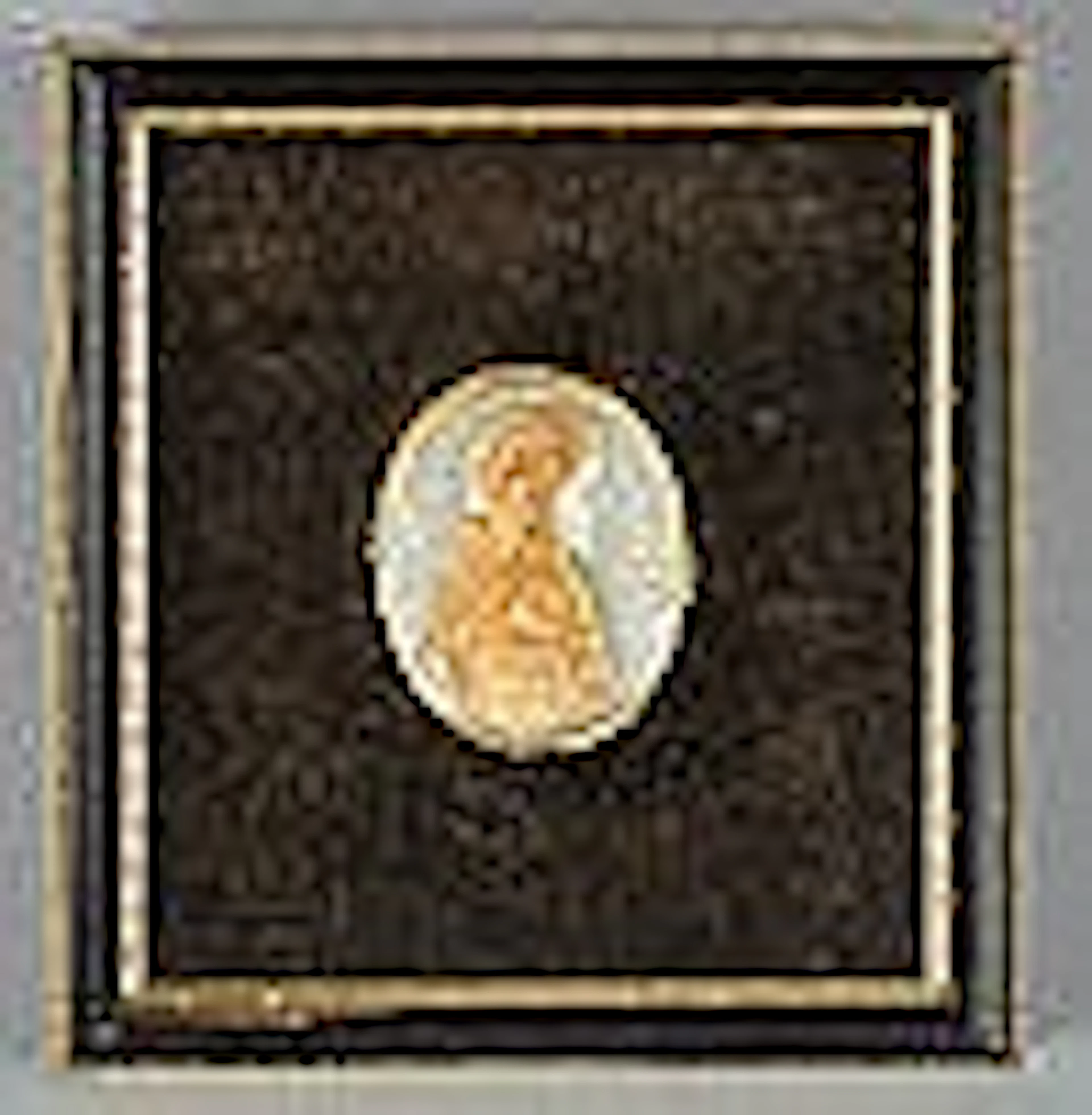 An early 20c oval portrait cameo miniature, named