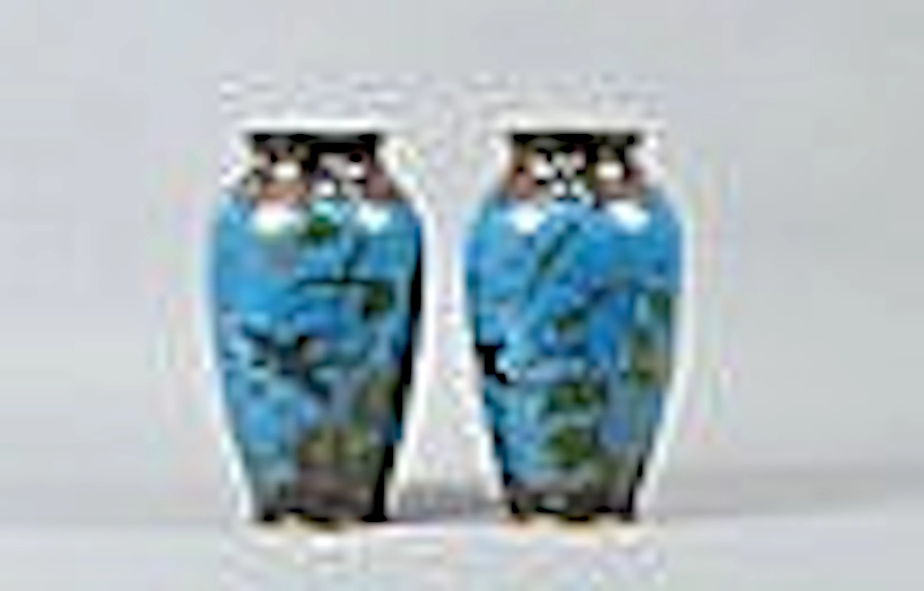 A pair of Oriental cloisonne enamel baluster vases