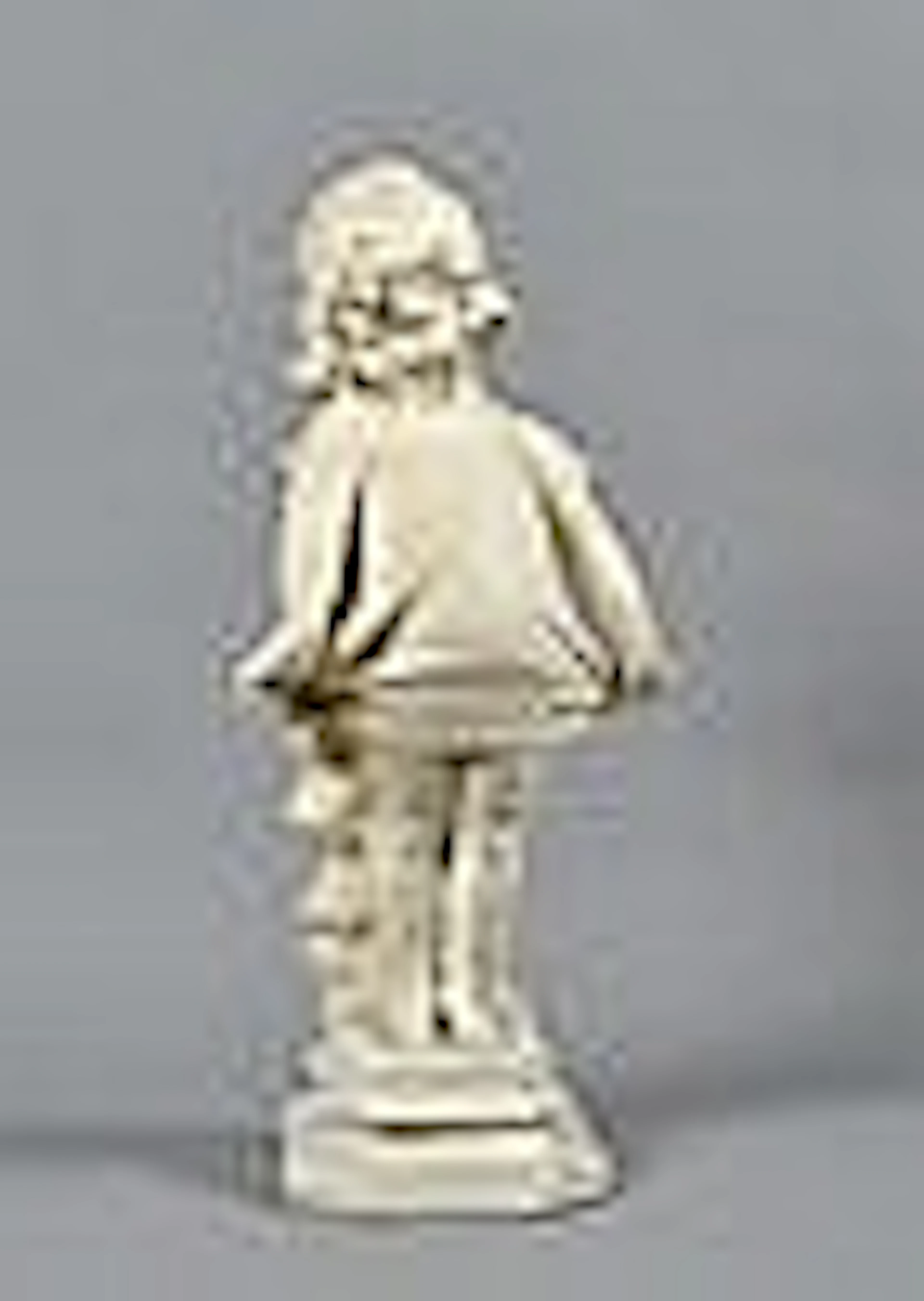 A white painted plaster cast figure of a shy young