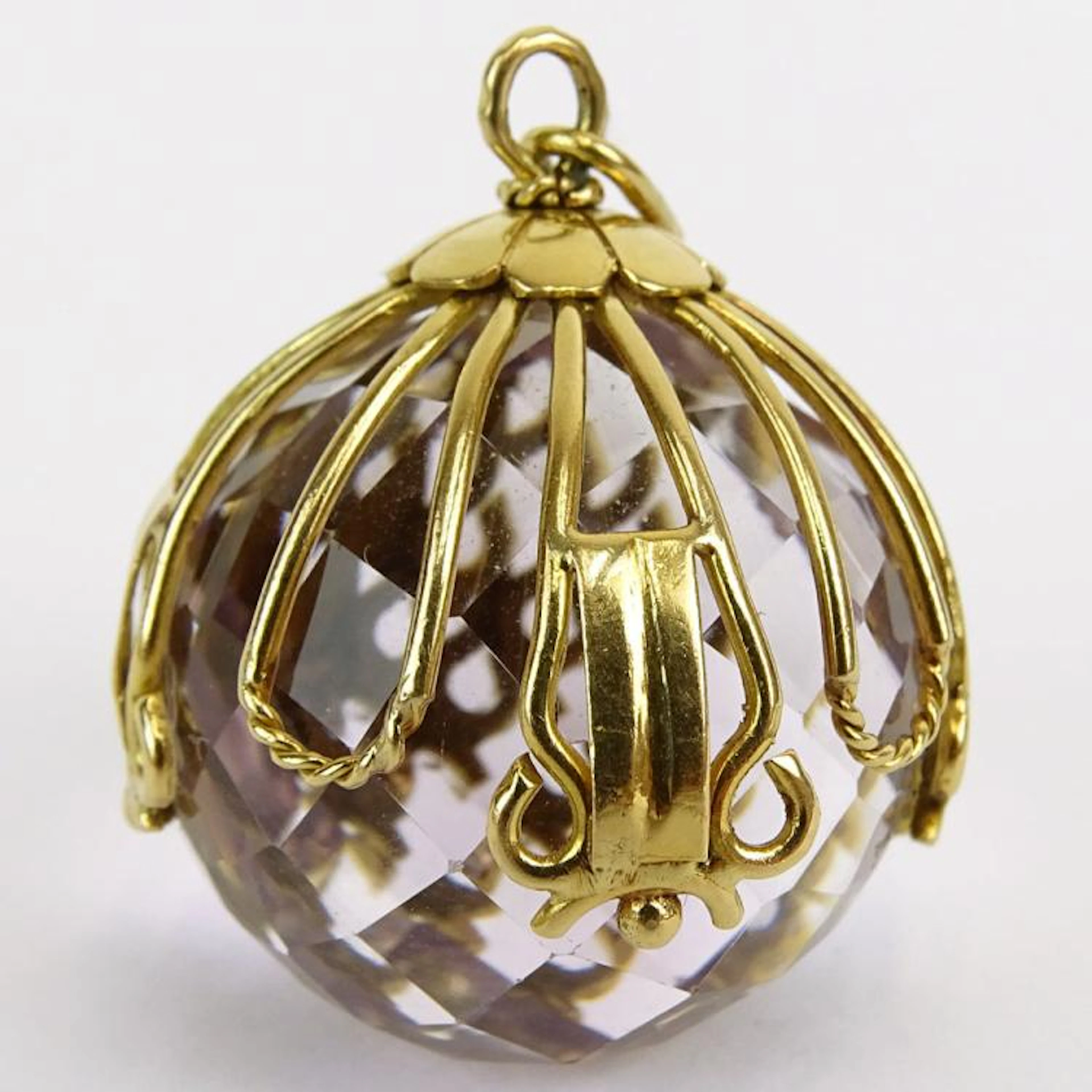 Lady's Vintage 18 Karat Yellow Gold and Briolette Amethyst Pendant. Unsigned. Good condition. Measures 1-1/8" H, 1" W. Approx. weight: 11.65 pennyweights. Shipping $28