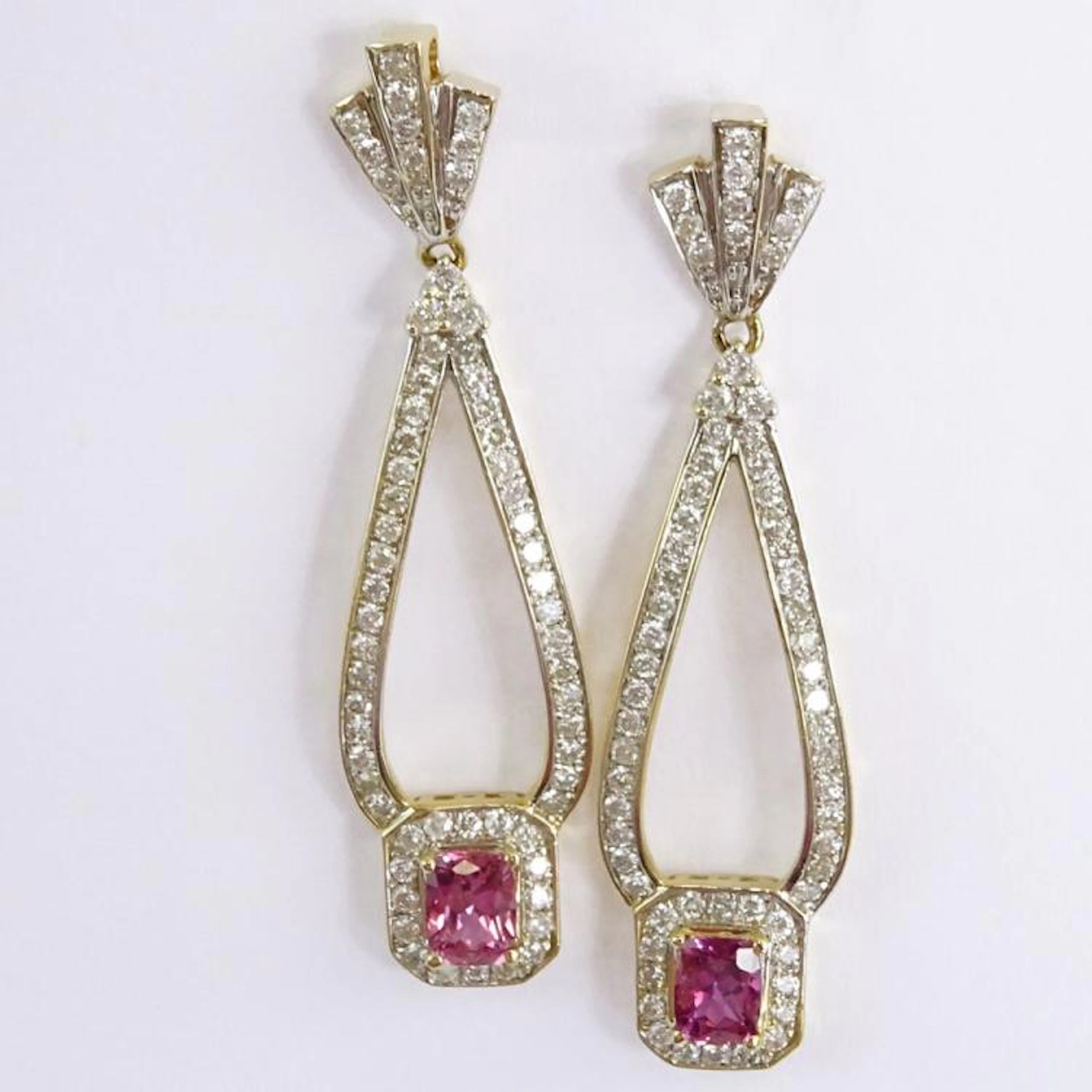 AIG Certified 1.46 Carat, total weight, Rectangular Cushion Cut Pink Sapphire, 1.42 Carat Round Brilliant Cut Diamond and 14 Karat Yellow Gold Pendant Earrings. Diamonds G-I color, I2-I3 clarity. Very