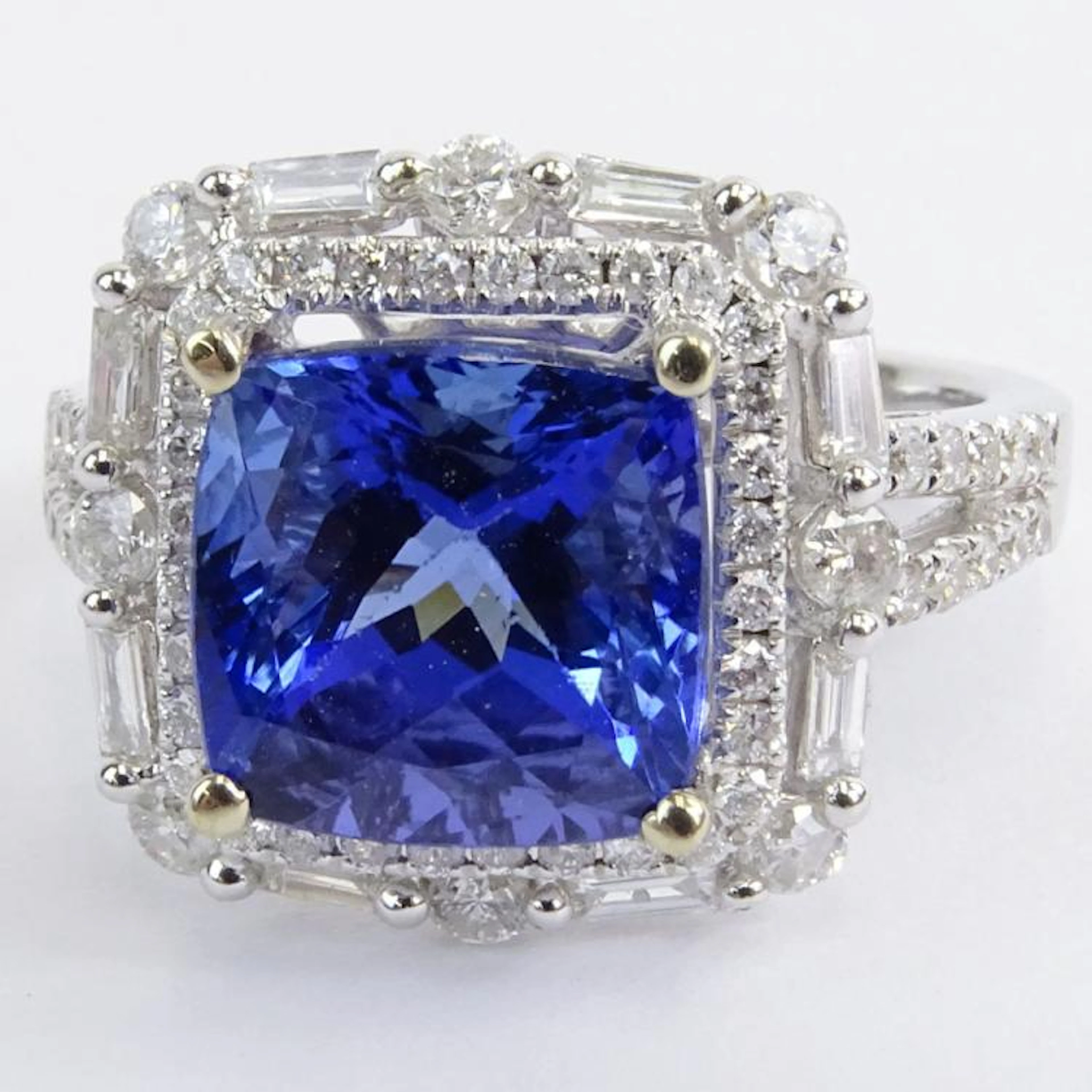AIG Certified 5.14 Carat Square Cushion Cut Natural Tanzanite AAA+ Quality Mined from "D" Block Section, .97 Carat Round Brilliant Cut and Baguette Diamond and 14 Karat White Gold Ring. Tanzanite with
