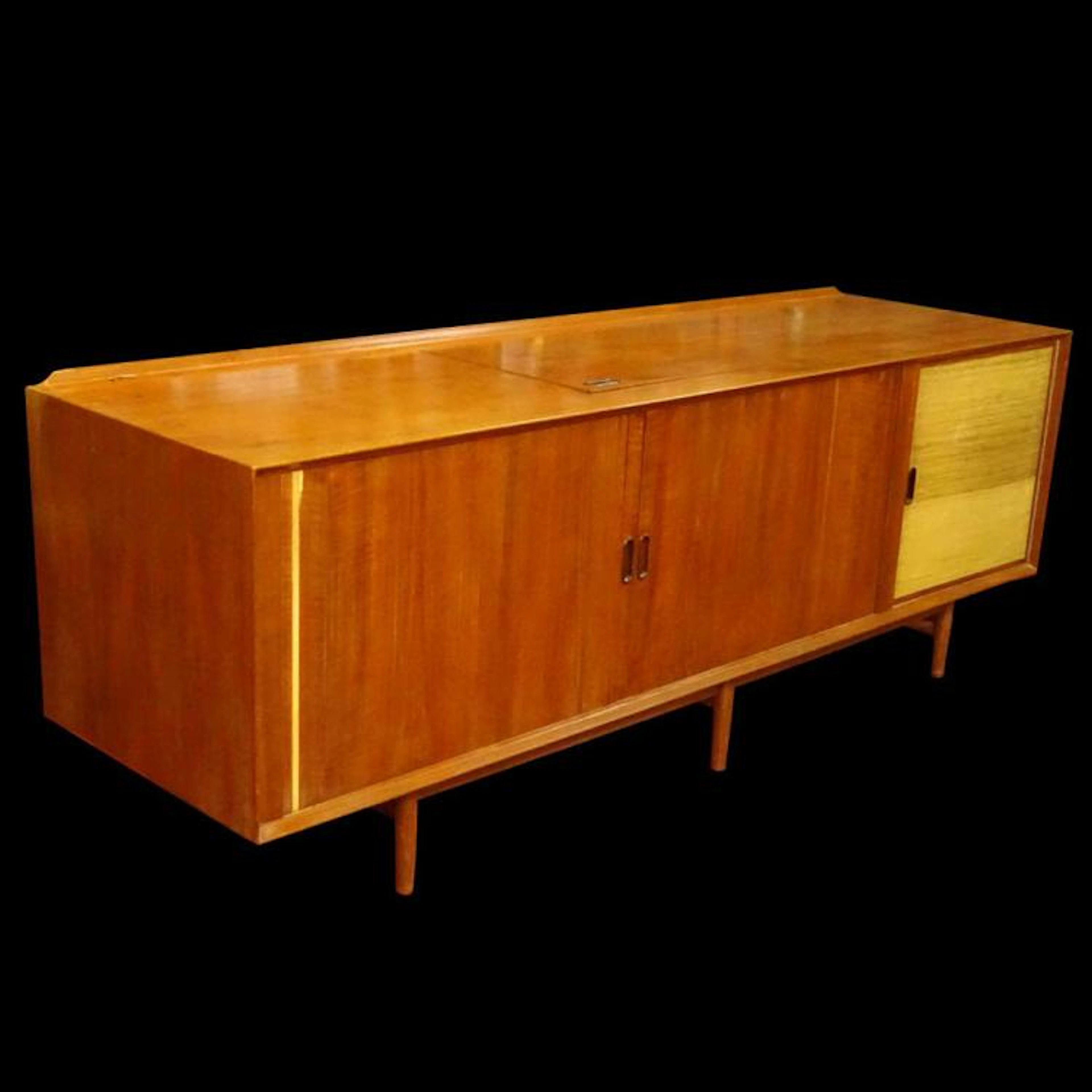 Arne Vodder, Danish (1926-2009) Circa 1960's Teakwood and Raffia Credenza. Unsigned. Rubbing, surface wear, strip of veneer missing, hole cut to back. Measures 30" H, 84" L, 24" D