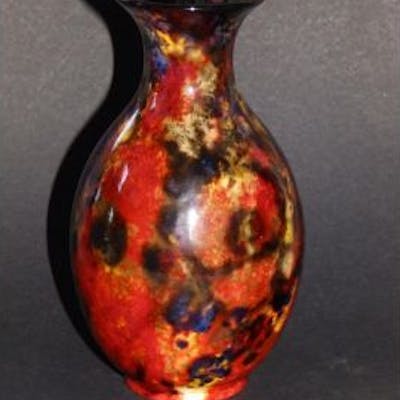 A Royal Doulton flambe vase, exhibiting a range of mottled coloured
