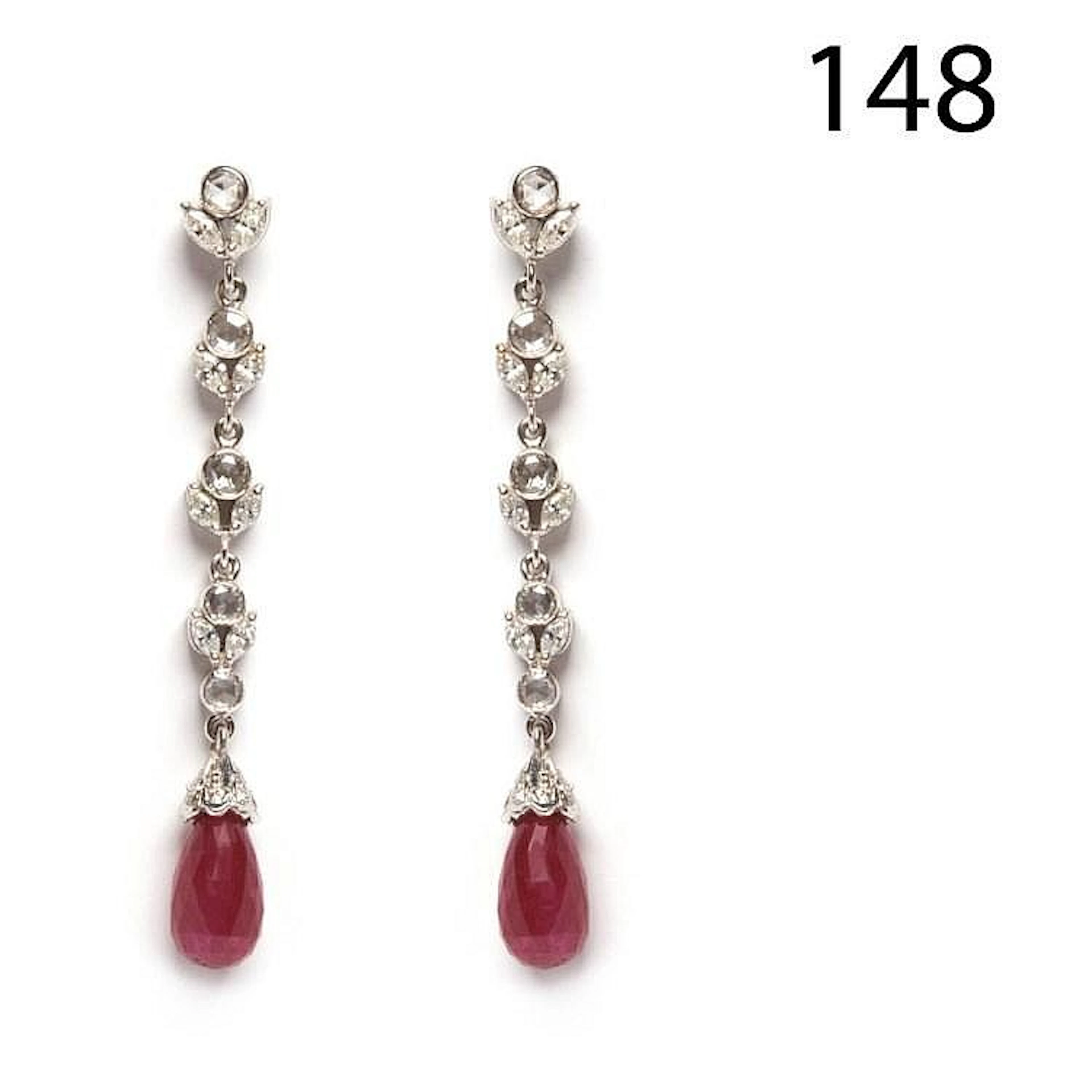 White gold , diamonds and ruby earrings