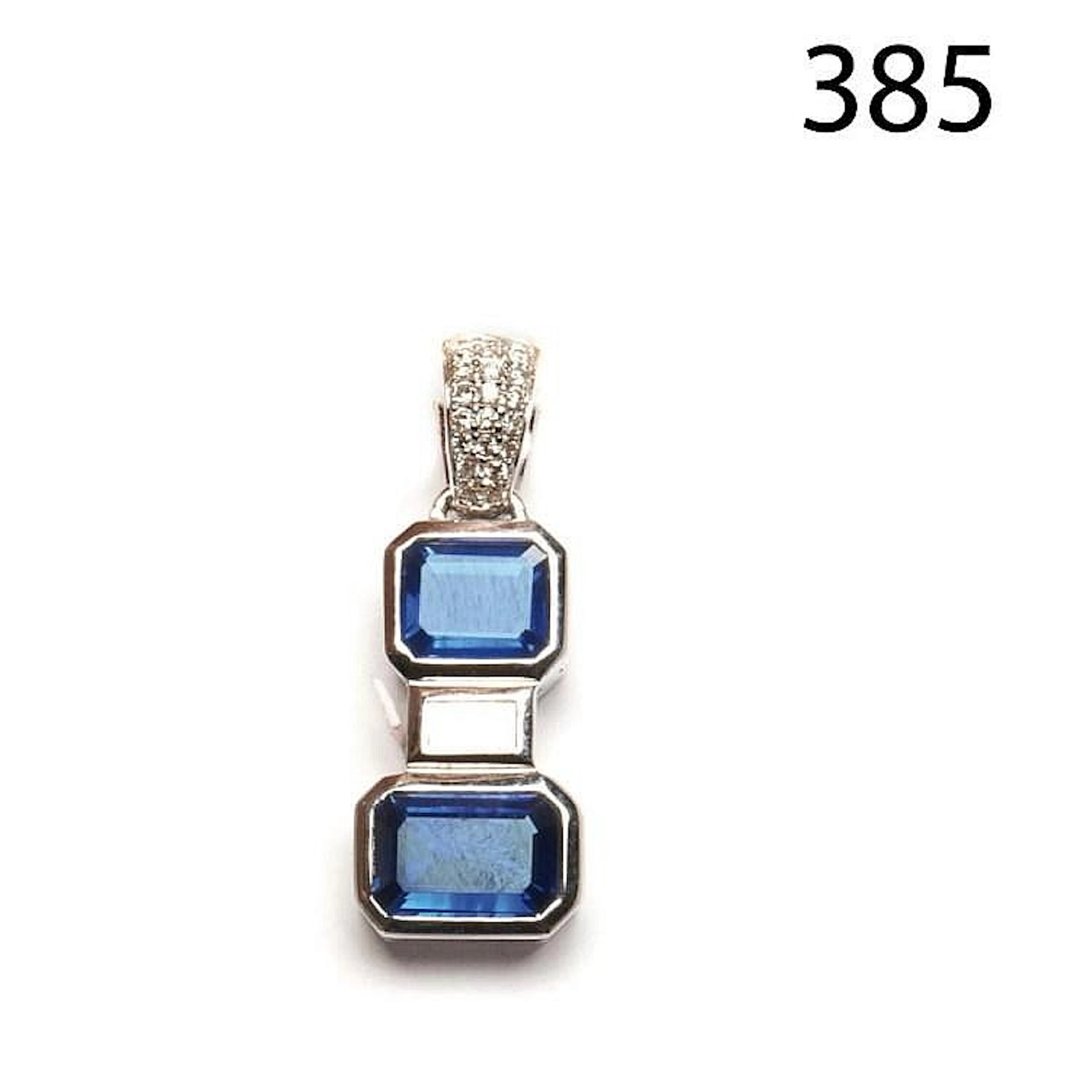 White gold, diamonds, blue sapphires pendant
