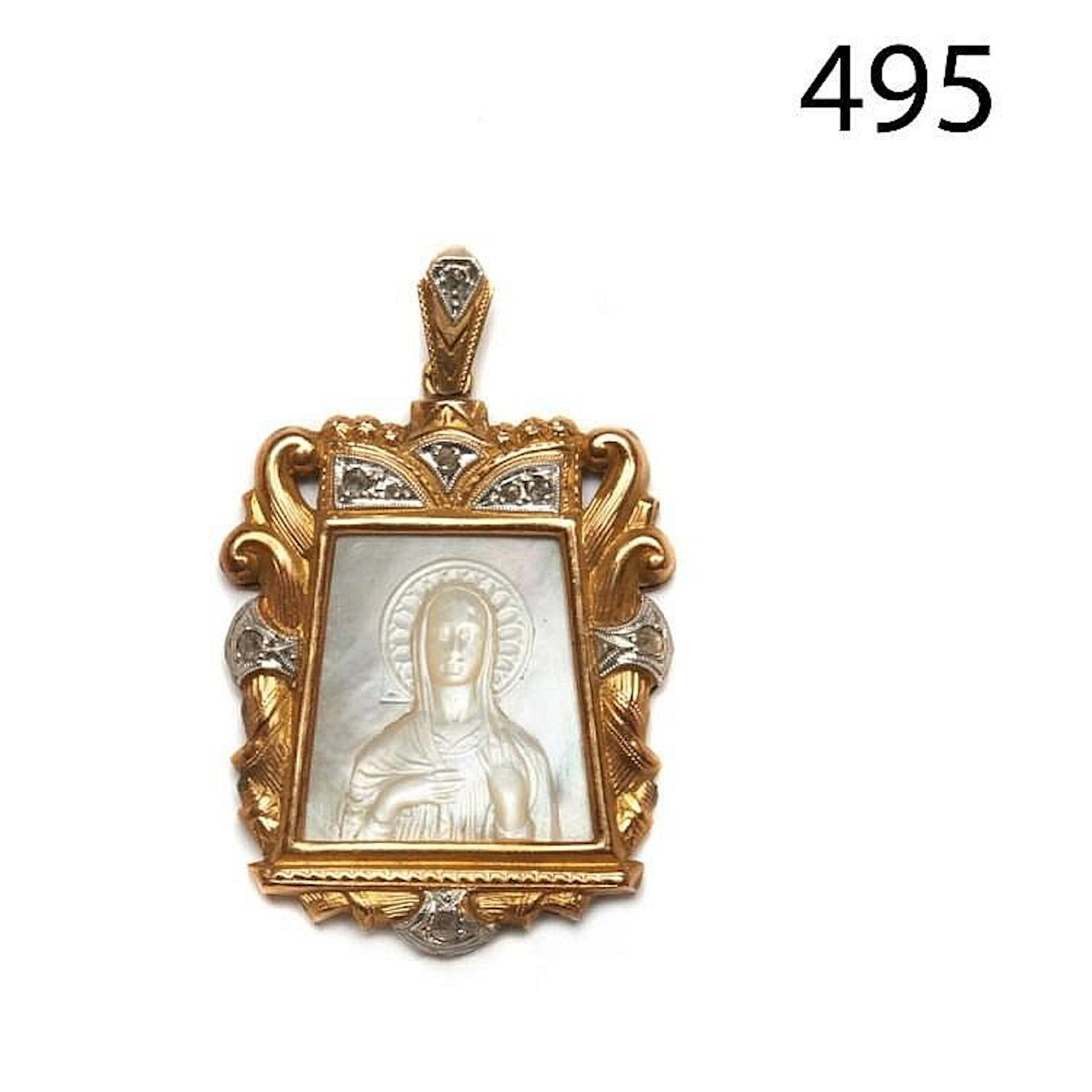 Gold, platinum, diamonds and motherpearl medallion