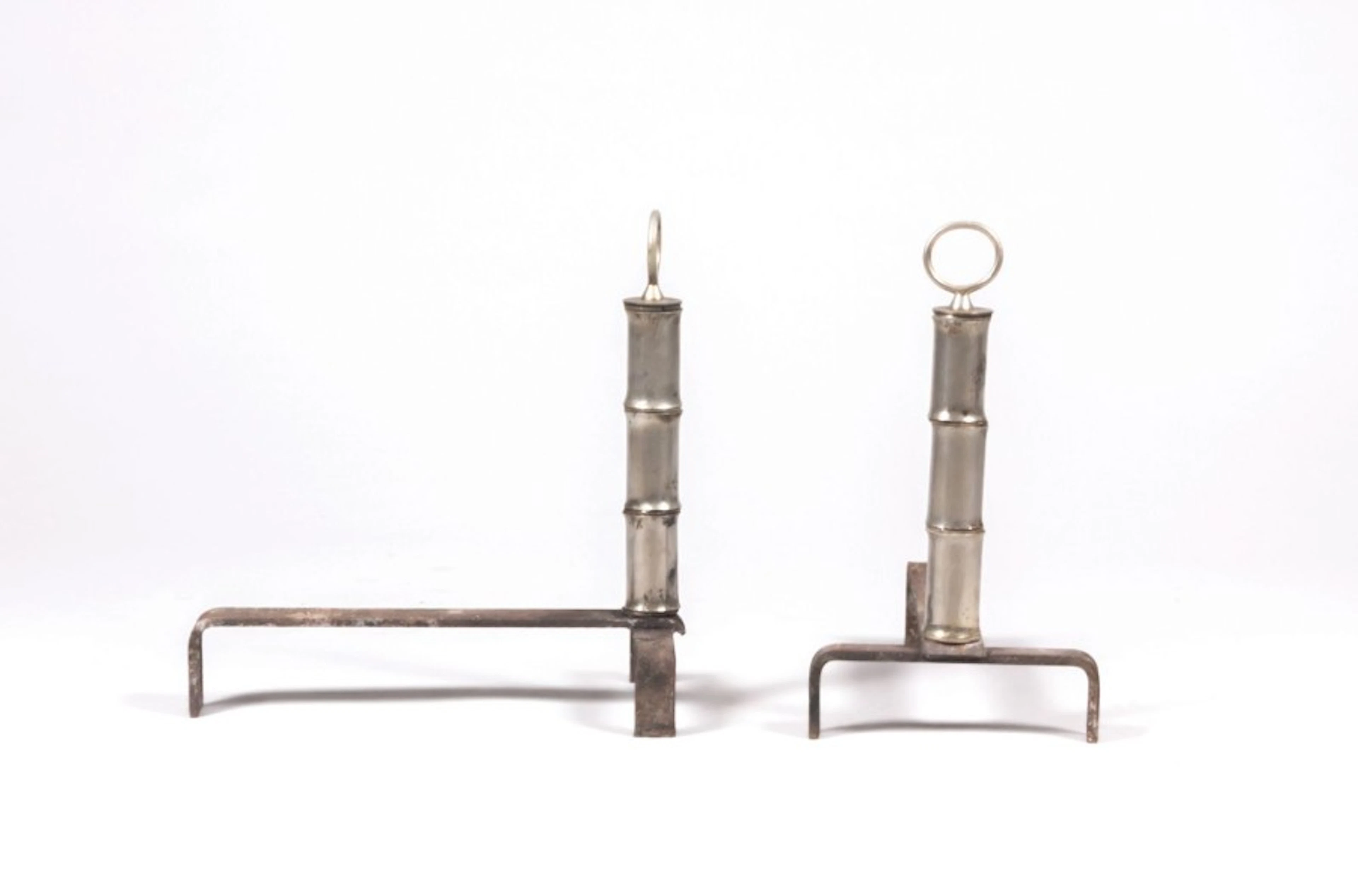 ADNET Jacques (1900-1984) Paire de chenets en laiton imitant...