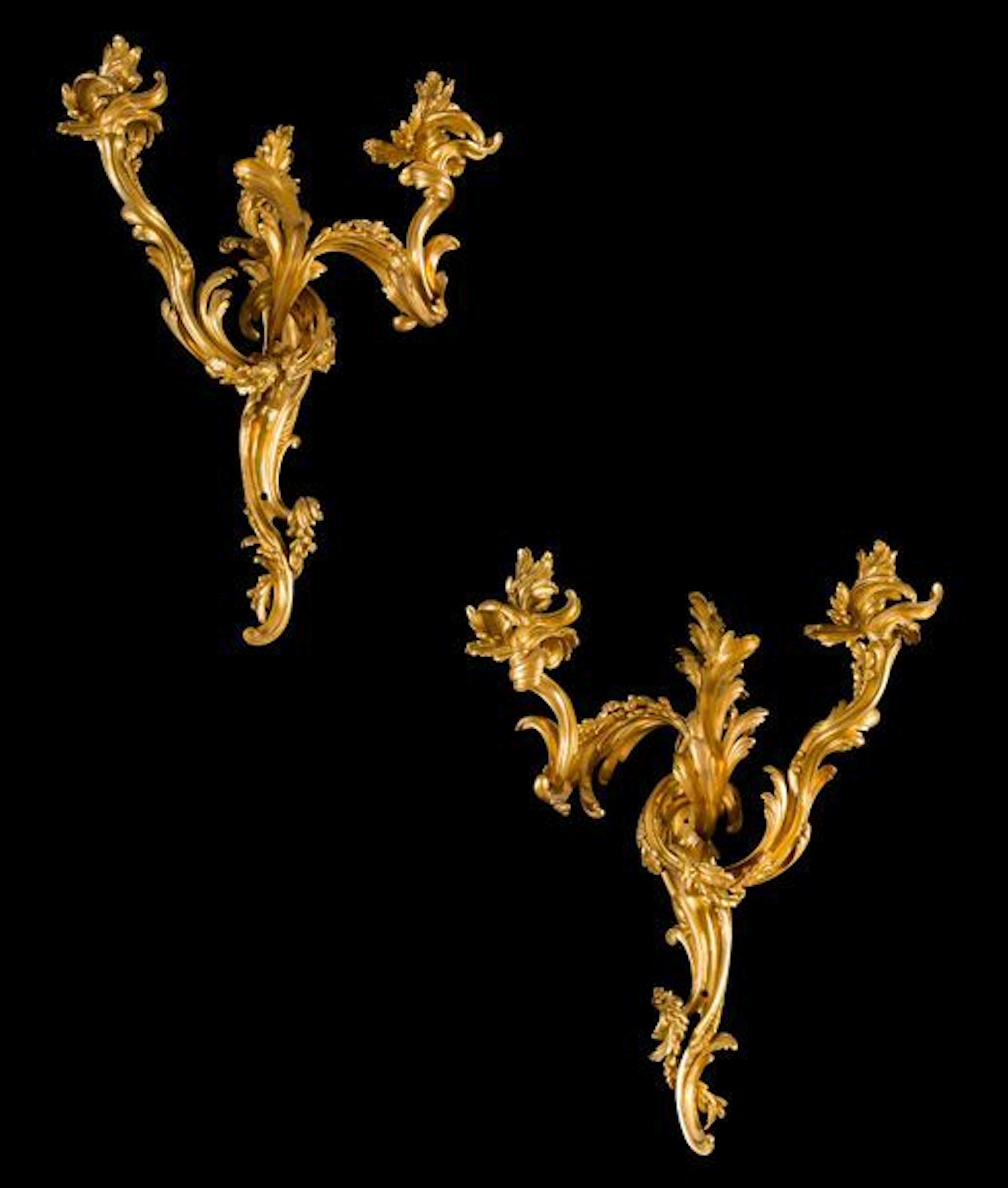 Paire de bras de lumière en bronze doré à...
