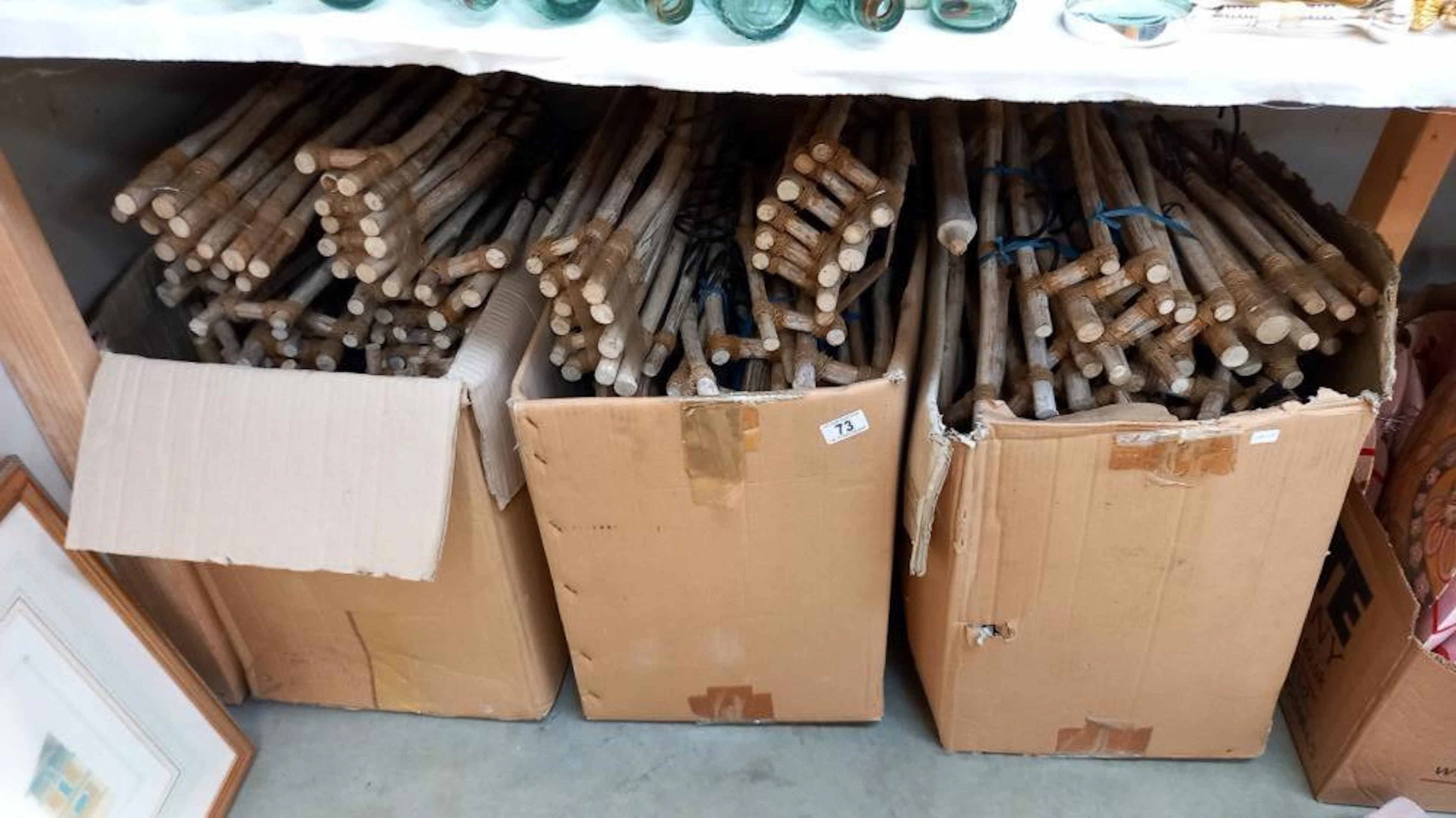 A large quantity of shabby chic/flintstones style wooden...