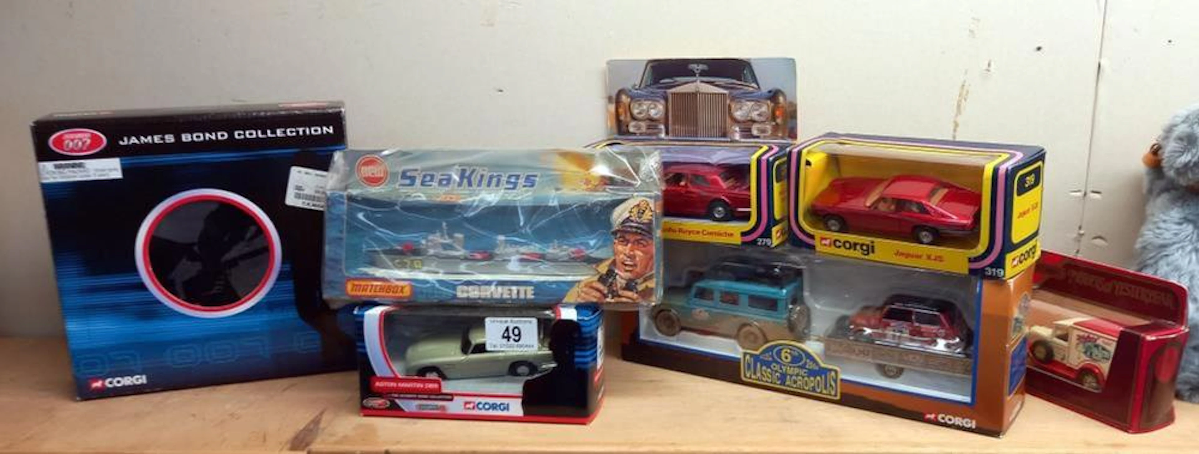 A collection of boxed diecast including James Bond...