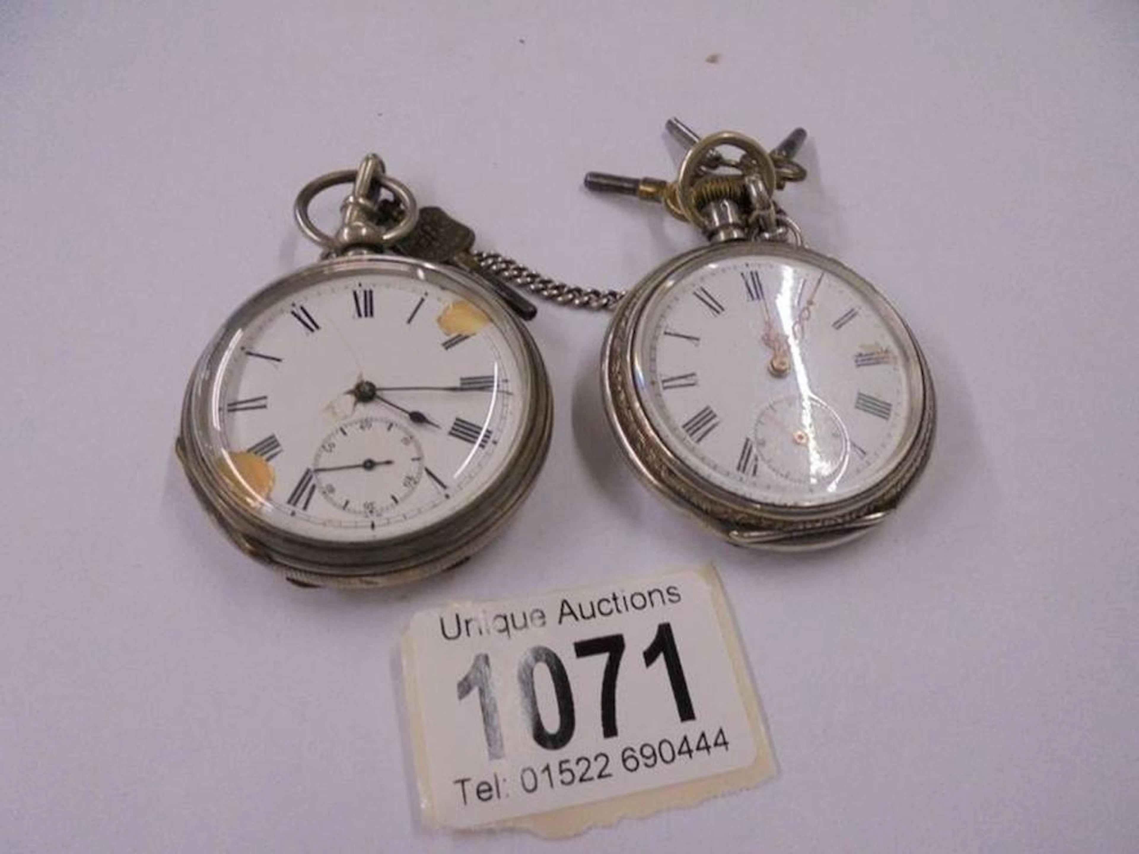 Two silver pocket watches