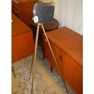 A vintage Coronet Model B camera on brass tripod, COLLECT ONLY.
