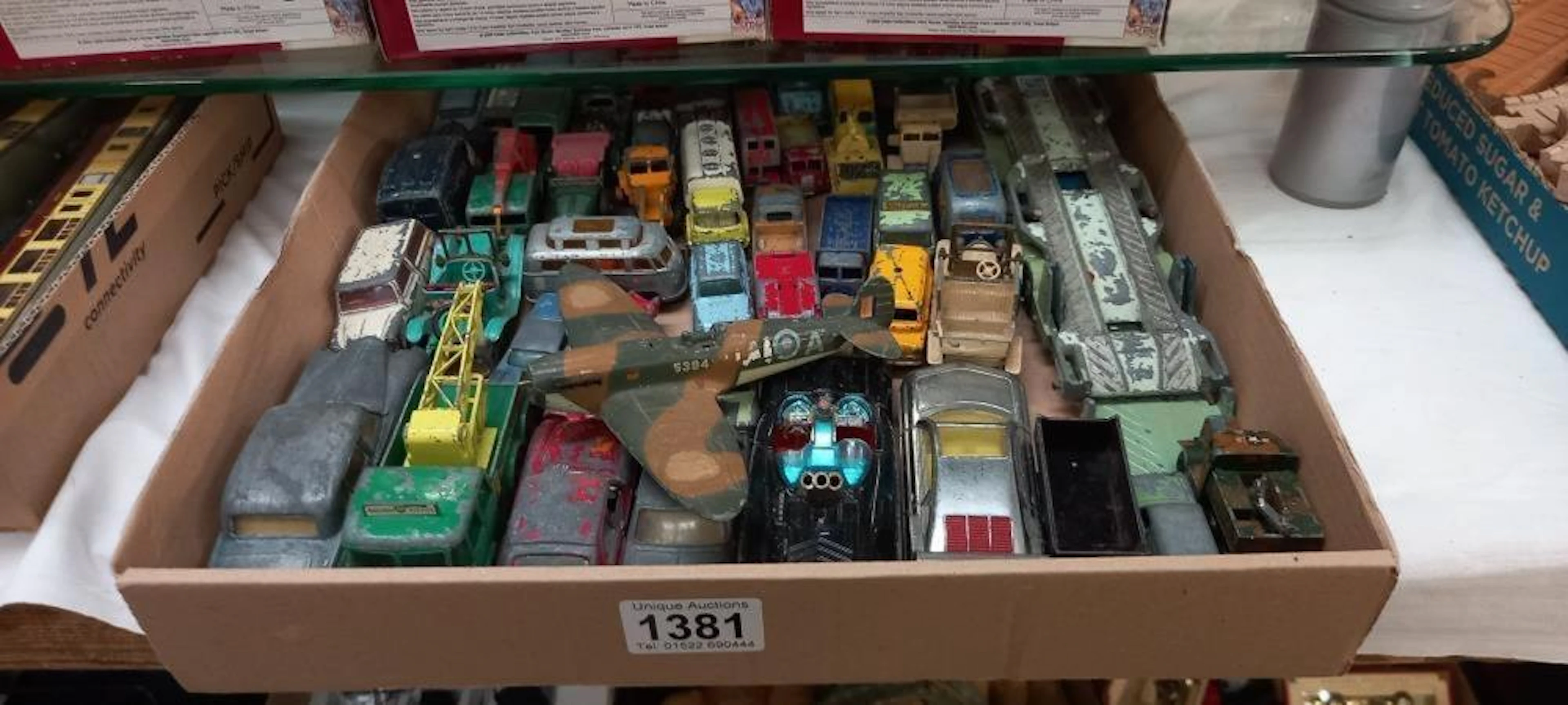 A box of play worn diecast including Corgi Spot-on and Lesney