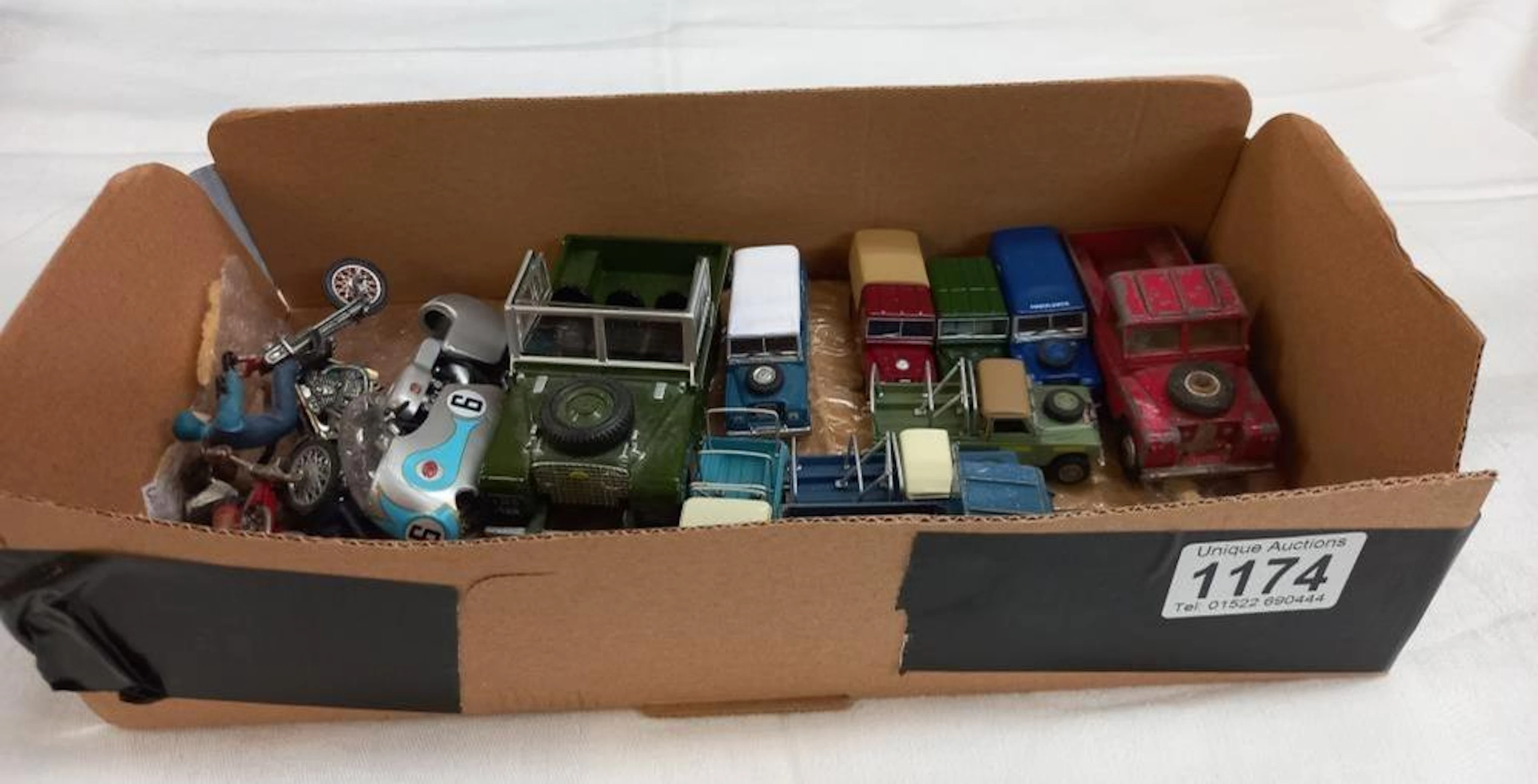 A box of diecast Landrovers including Corgi