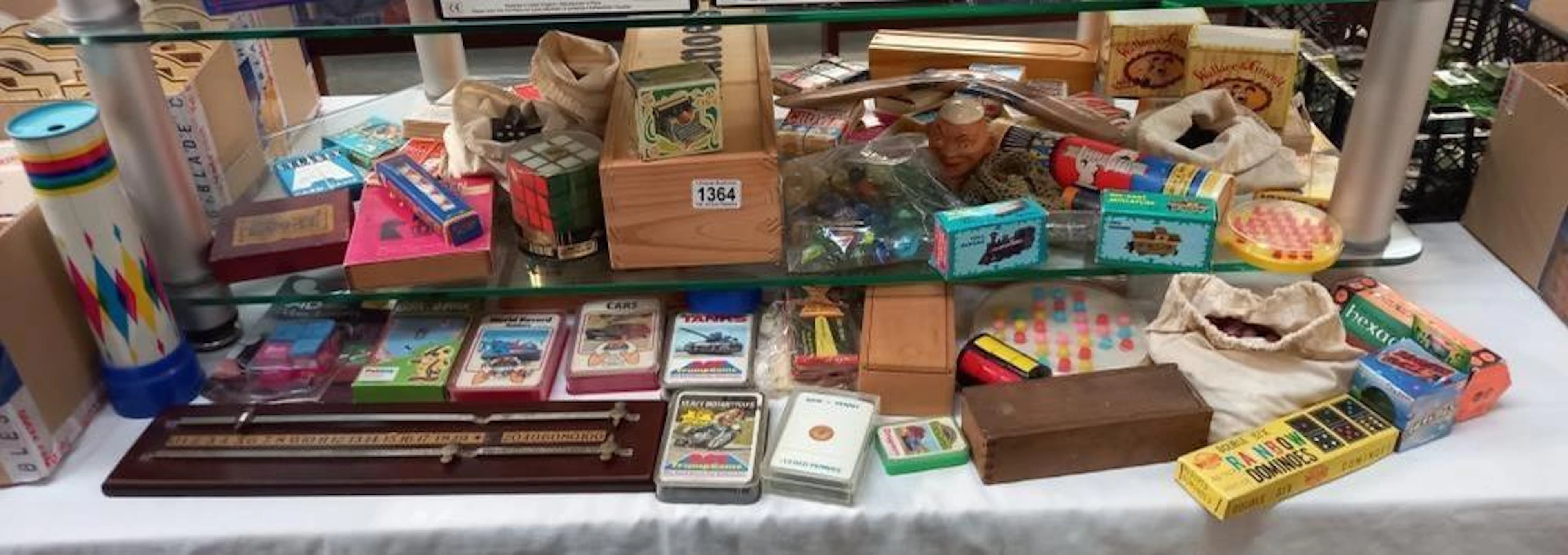 Large lot of games etc, including Rubik's cube, marbles, dominoes, cards etc