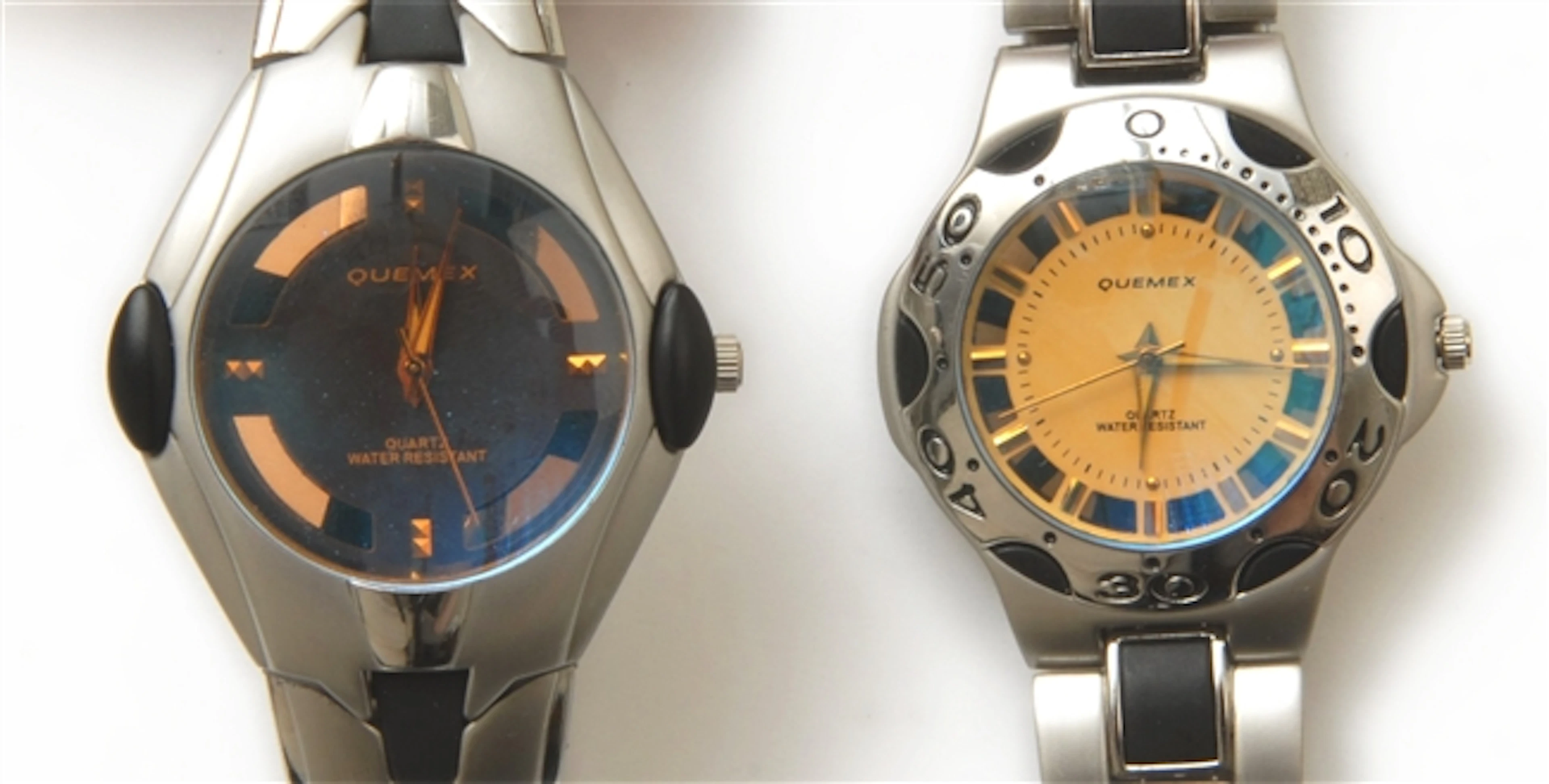 A pair of Quemex quartz wrist watches, fitted