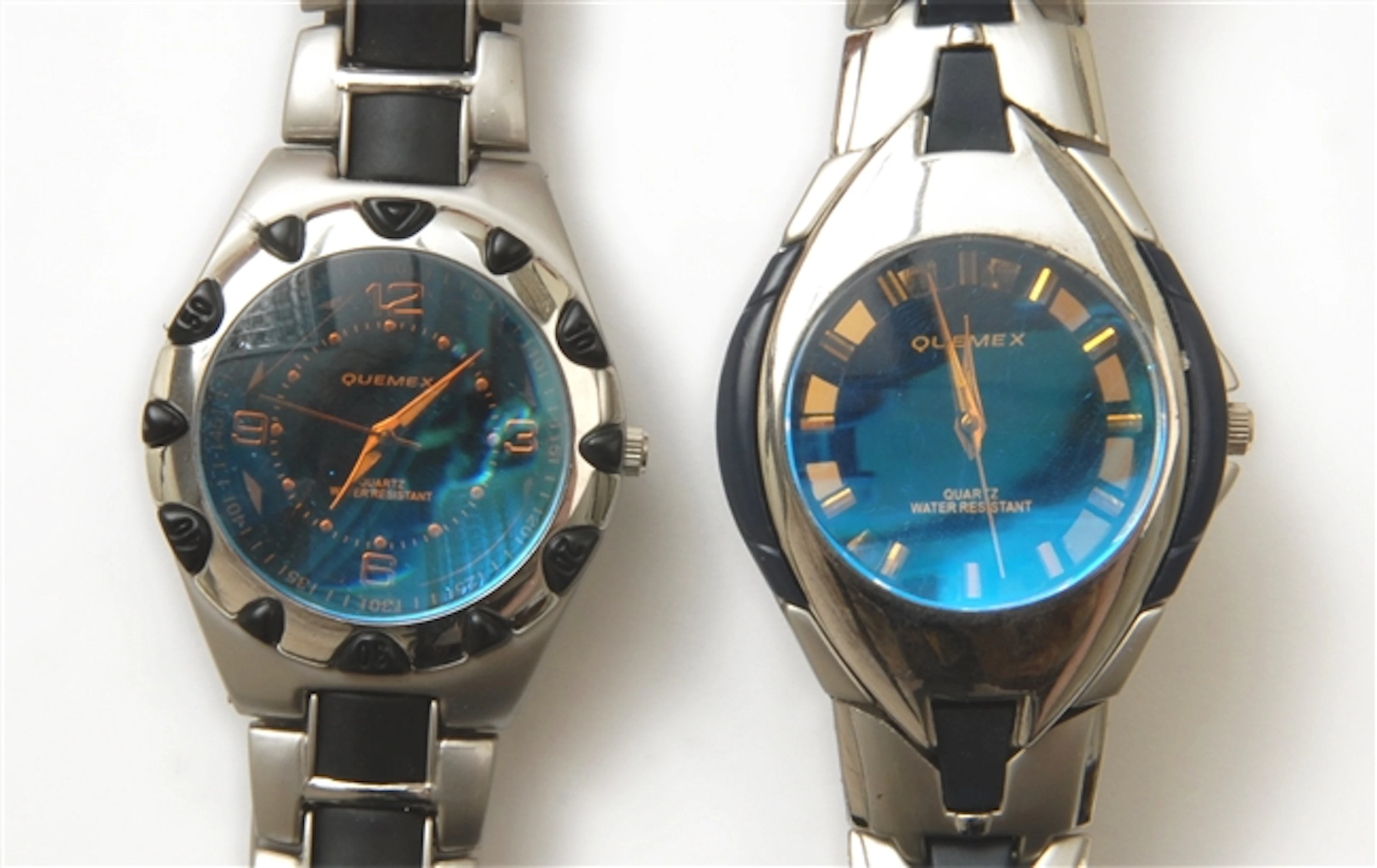 A pair of Quemex quartz wrist watches, fitted