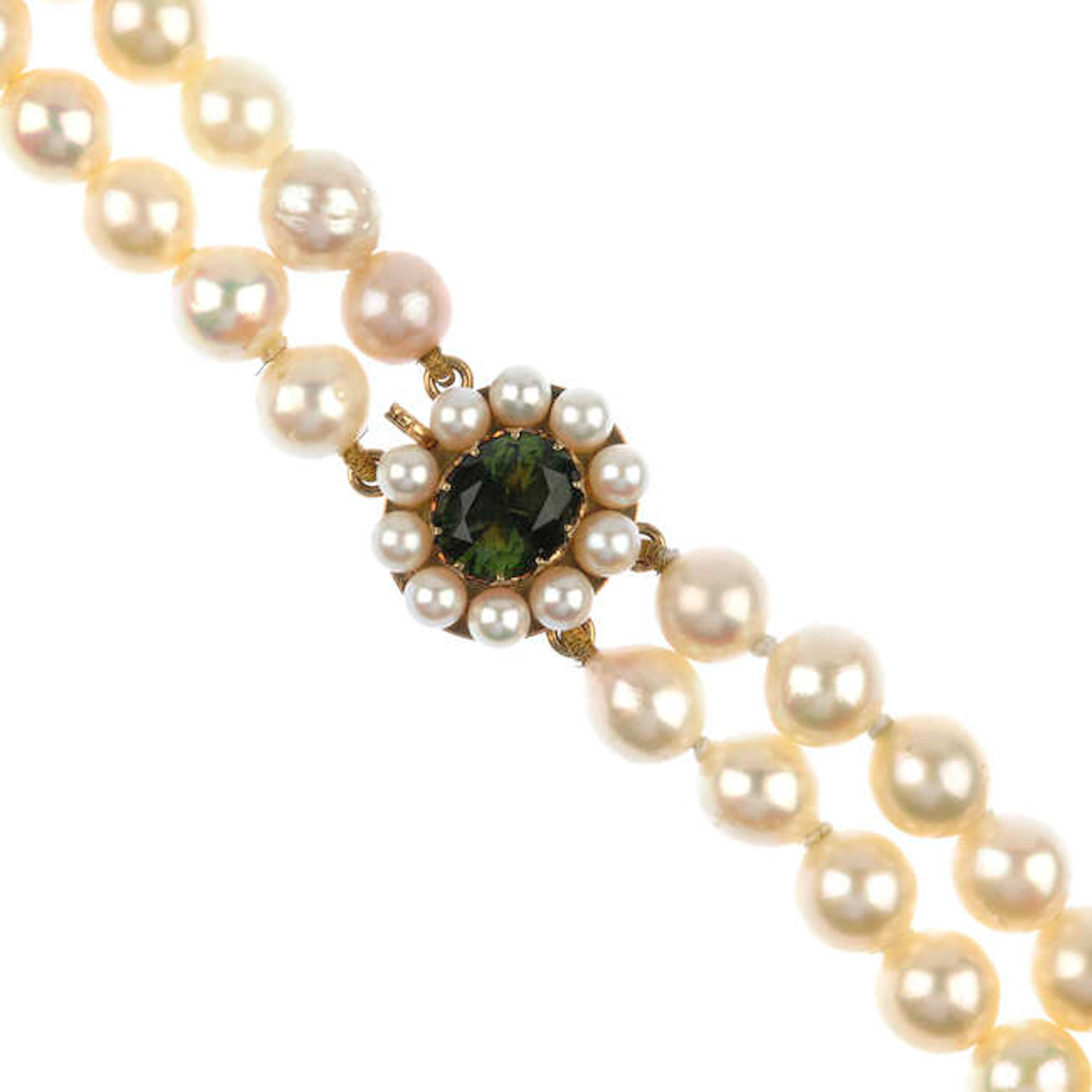 A cultured pearl double-row necklace with moldavite clasp.