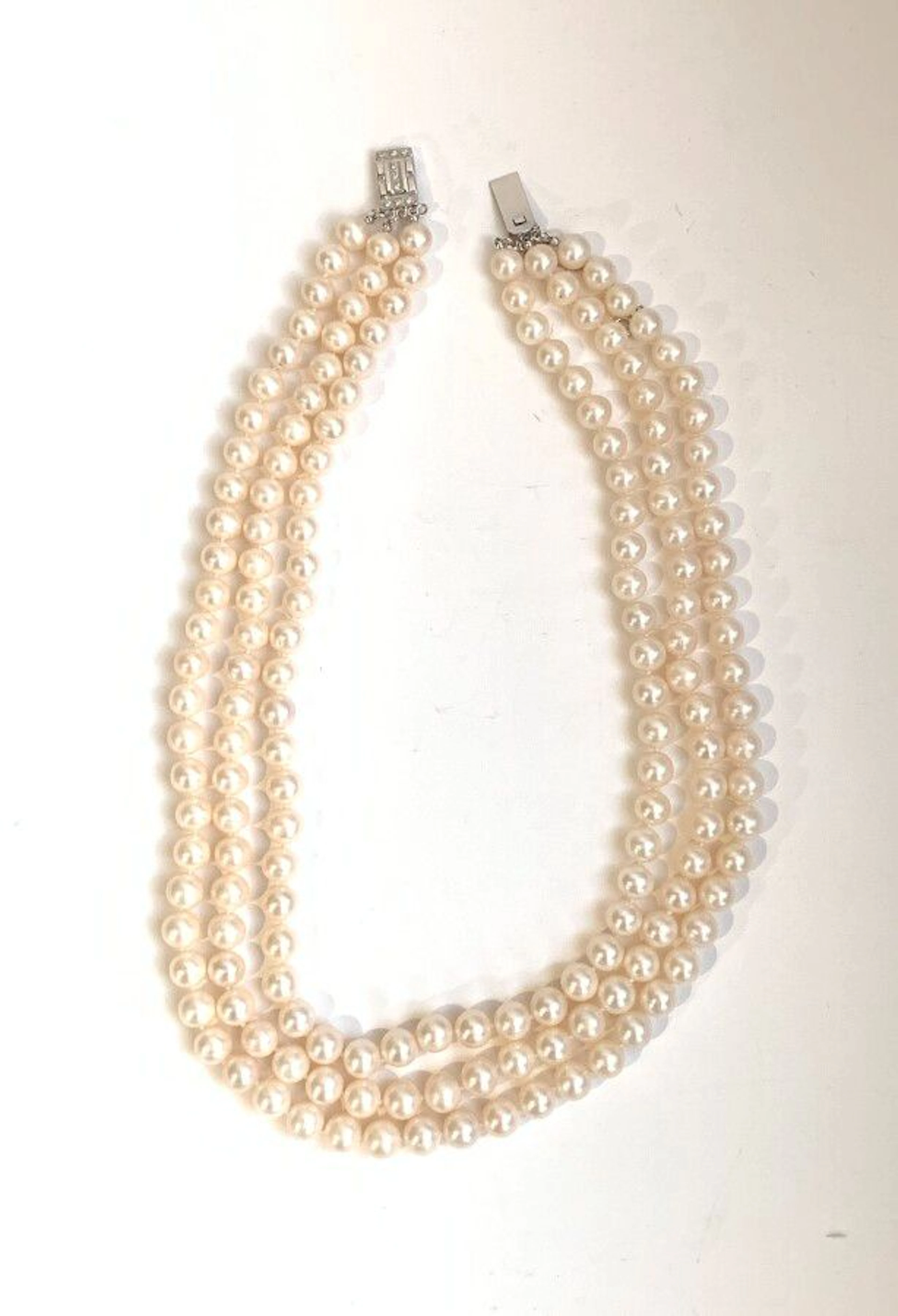 COLLIER "Jackie Kennedy" composé de trois... - Lot 128 - Eve
