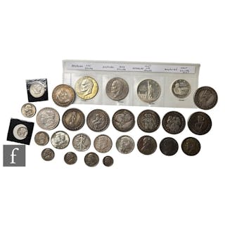 An American 1879 Morgan dollar, a 1943 half dollar, various ...