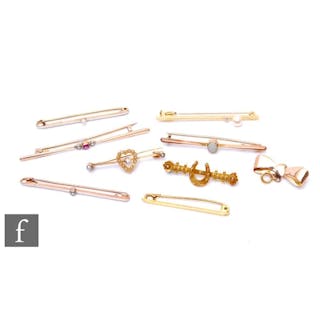 Eight assorted 18ct and 9ct stone set bar brooches to includ...